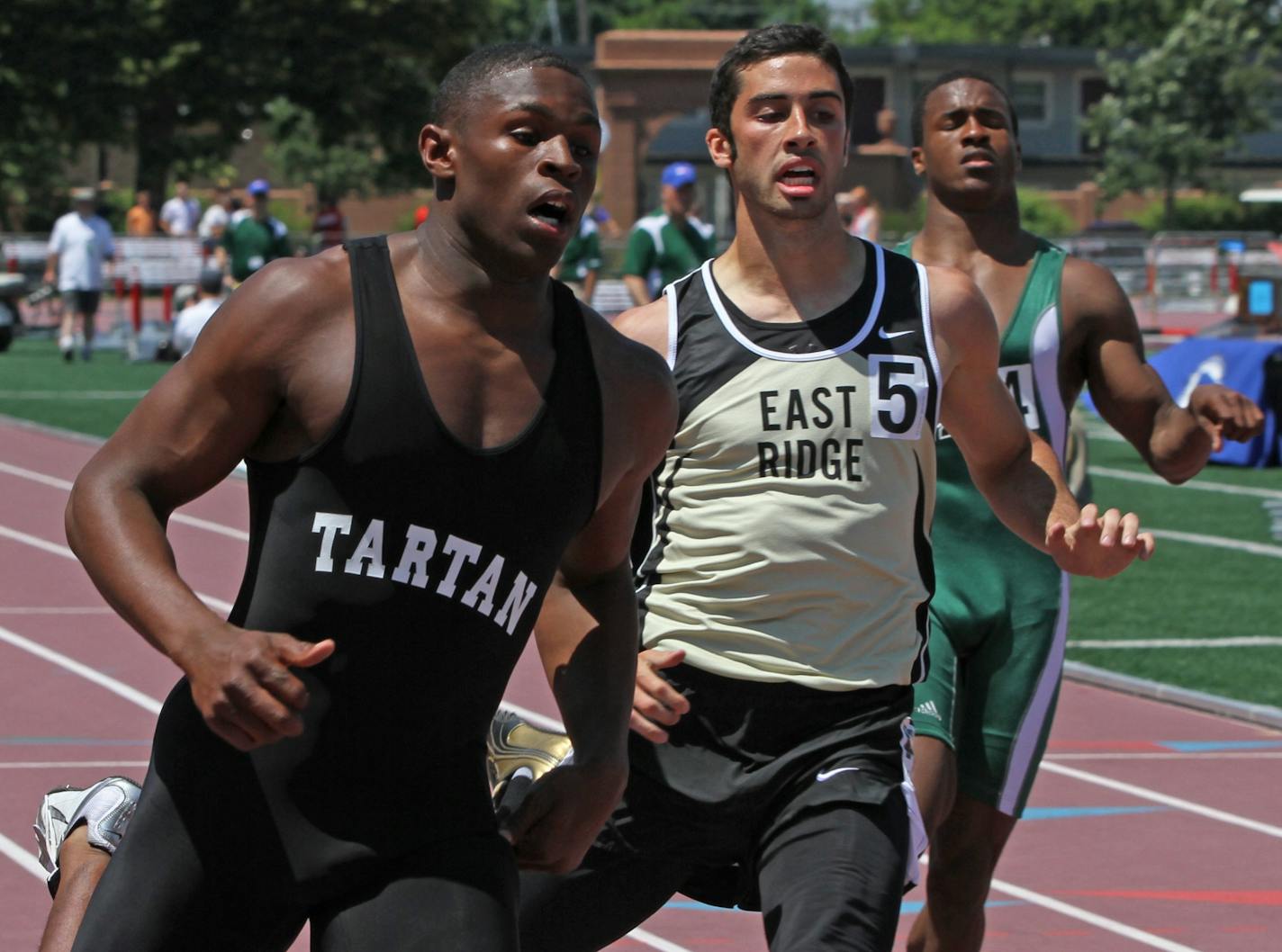 Tartan's Keelon Brookins (left) reportedly has decommitted from the Gophers football team and plans to go to Wisconsin.