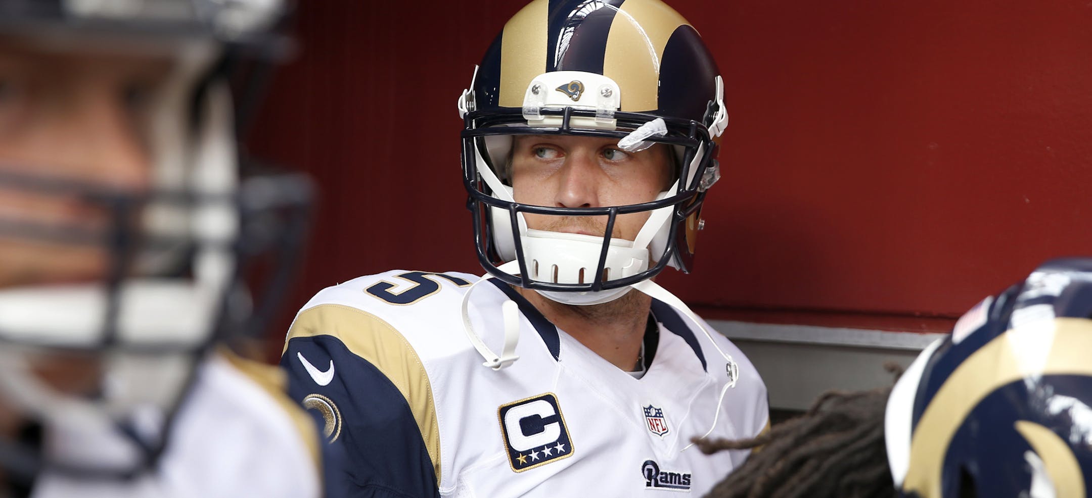 St. Louis Rams quarterback Nick Foles (5) looks over his shoulder as he waits for his introduction before an NFL football game against the Washington Redskins in Landover, Md., Sunday, Sept. 20, 2015. (AP Photo/Alex Brandon)