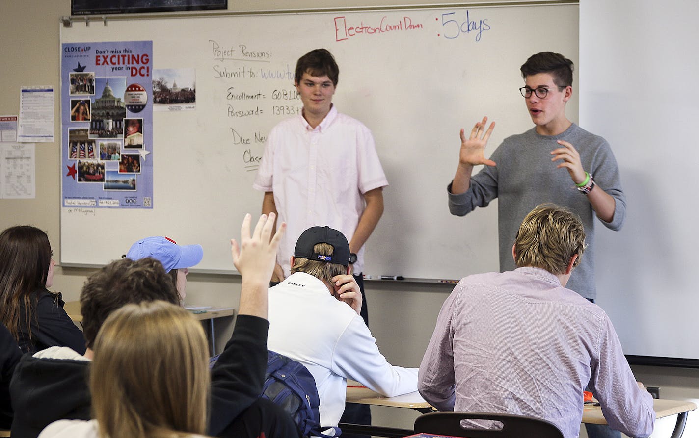 Chanhassen High School seniors Elijah Rockhold and Sam Buisman, who started the club, talked about the latest election issues with their peers.