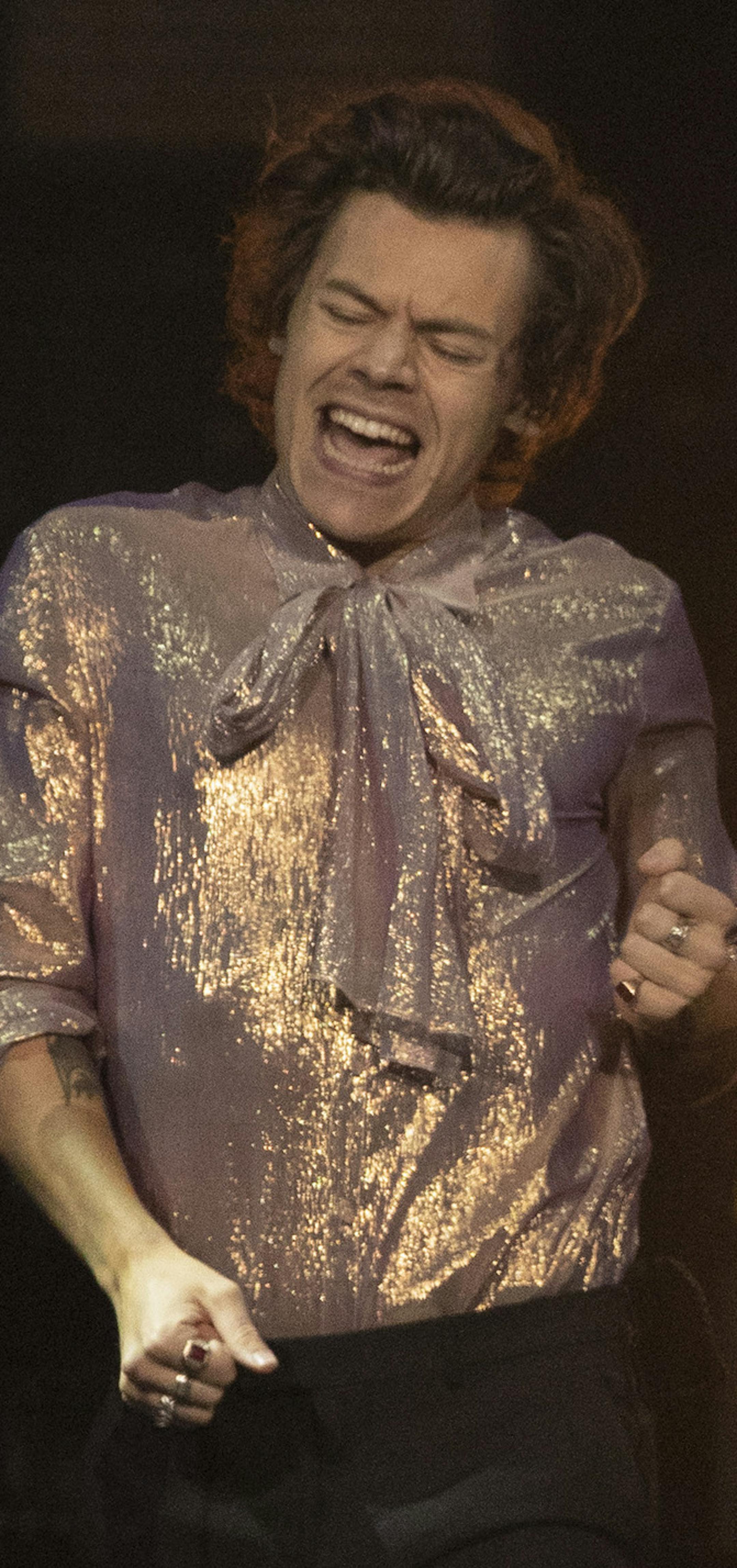 Harry Styles danced during the first song of his set Sunday night. ] JEFF WHEELER • jeff.wheeler@startribune.com Former One Direction heartthrob Harry Styles made his solo debut Sunday night, July 1, 2018 at Xcel Energy Center in St. Paul.