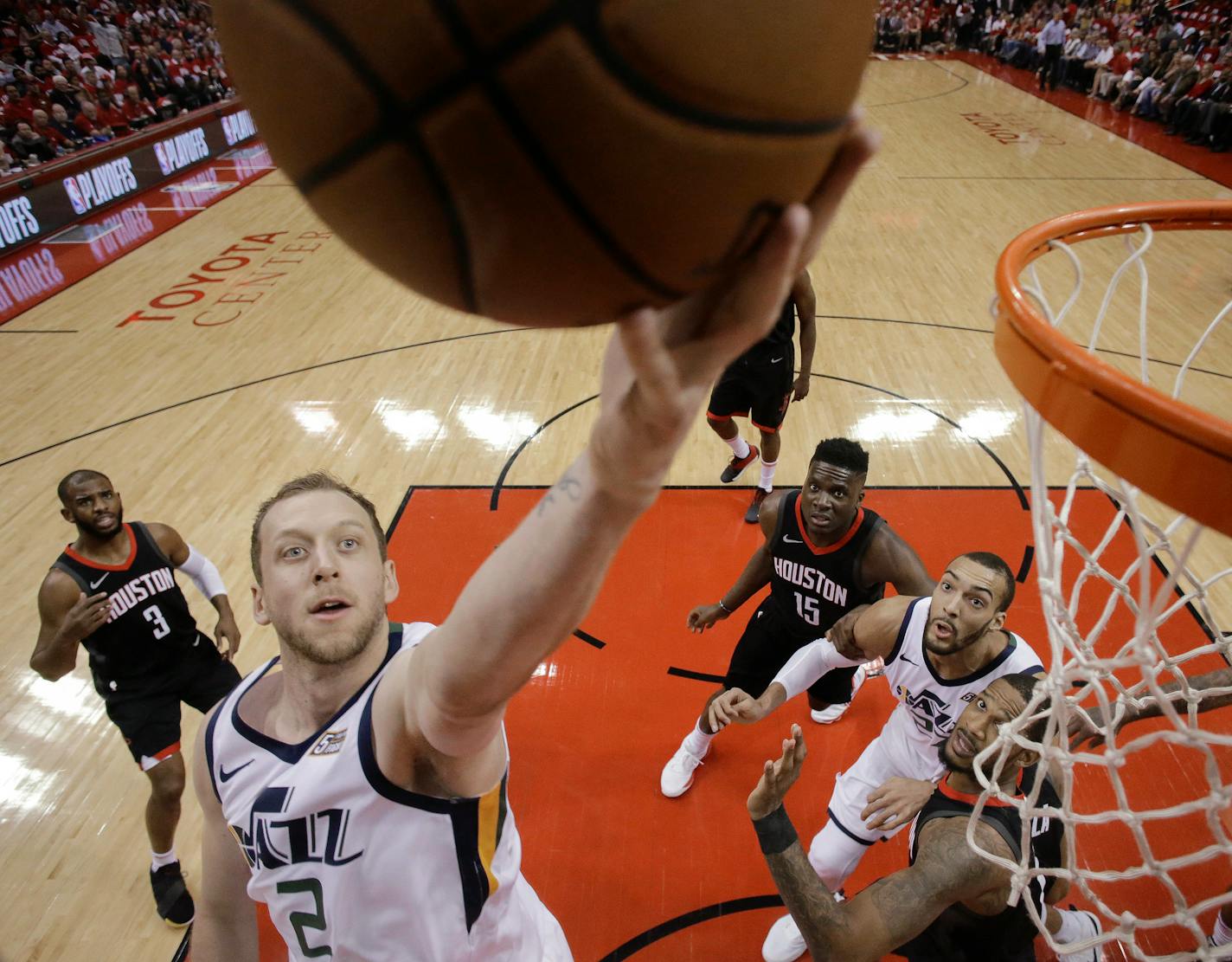 Jazz forward Joe Ingles drives to the basket during the first half