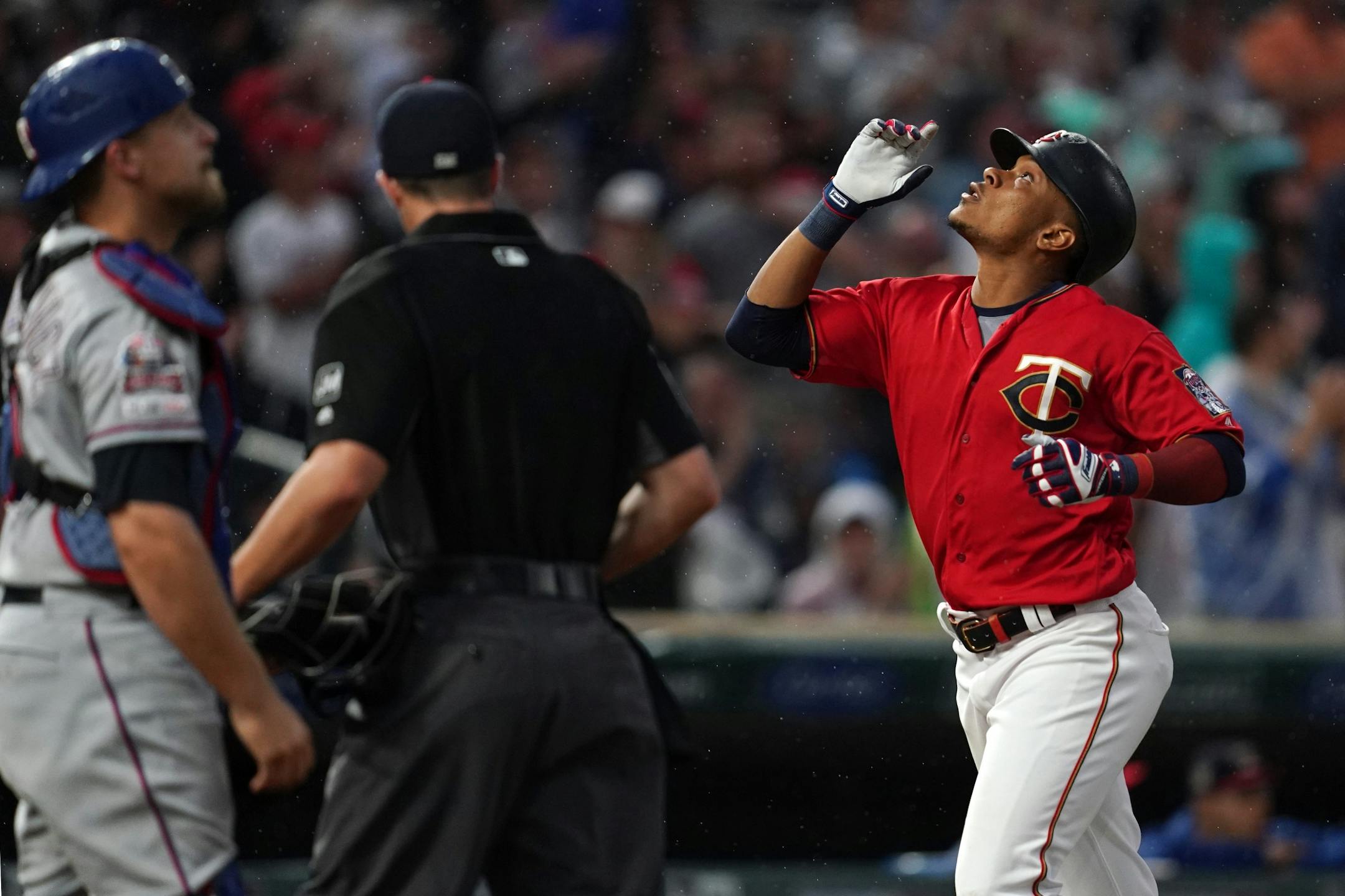 Minnesota Twins shortstop Jorge Polanco (11) celebrated as he crossed home plate after hitting a home run in the second inning.