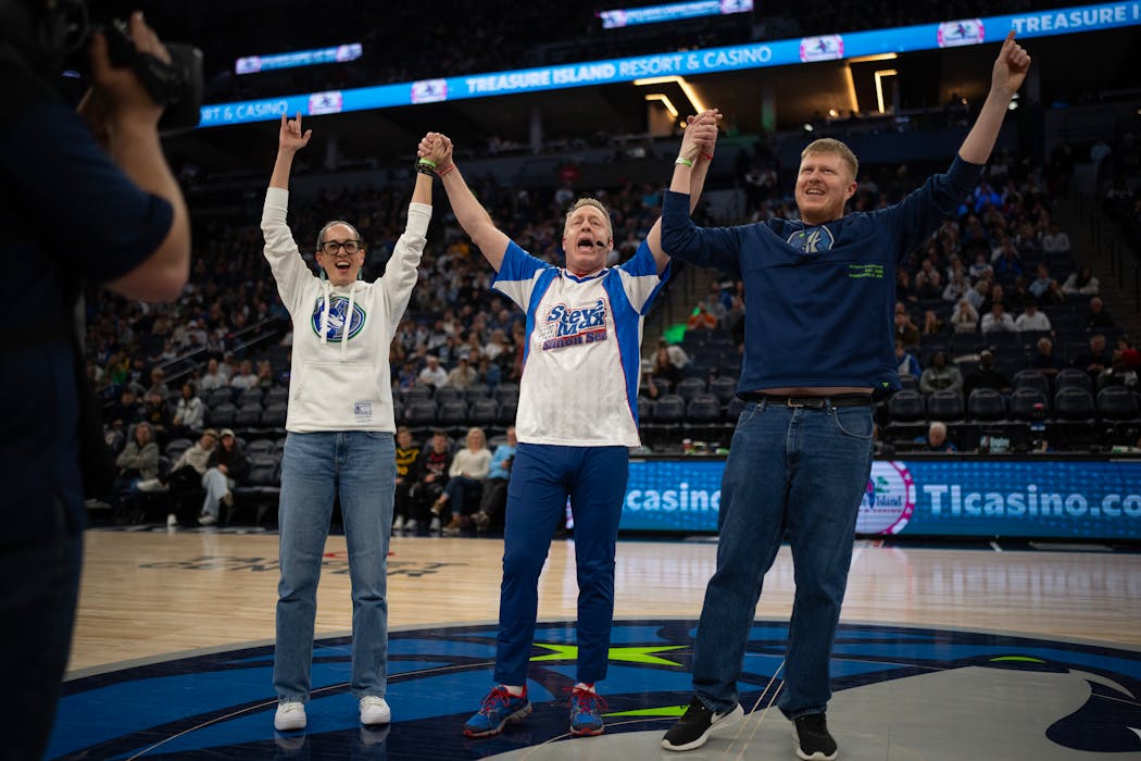 For 21 years, Steve Max, center, has been playing his signature speed game of “Simon Sez,” his take on the classic children's game of the same name, with halftime participants and corporate crowds.