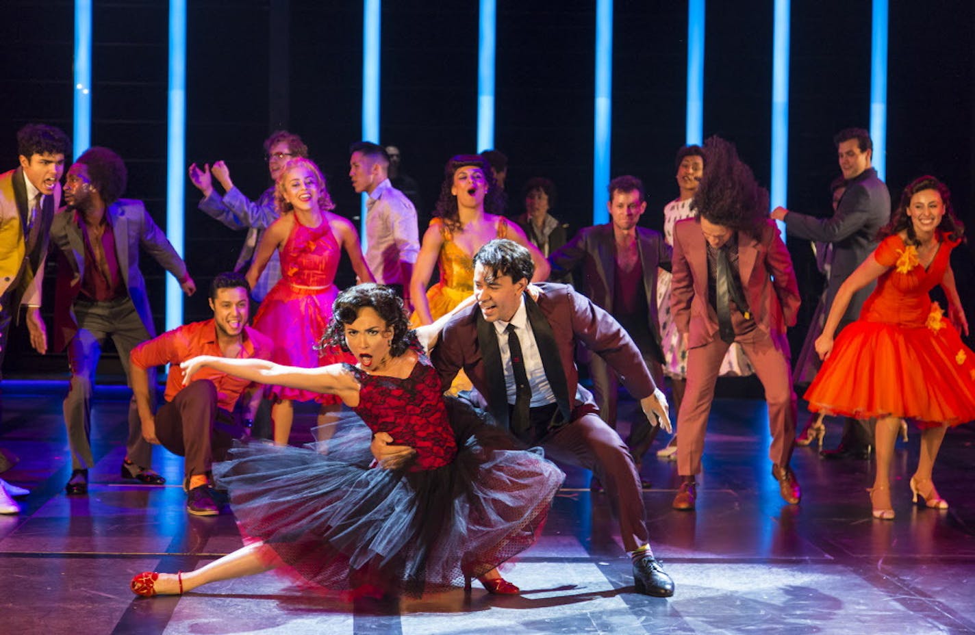 Ana Isabelle (Anita), Marco Antonio Santiago (Bernardo) and the cast of the Guthrie Theater&#xed;s production of "West Side Story."
Photo by T. Charles Erickson