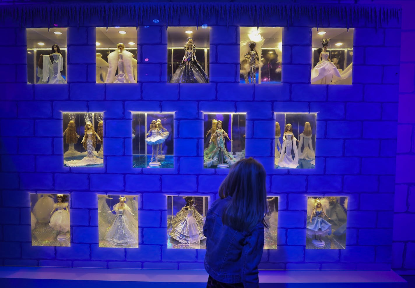 Dozens of vintage Barbies are on display in the Barbie Dreamhouse Experience photographed on Tuesday, February 11, 2014 in Bloomington, Minn. The 30,000 square foot exhibit is the largest Barbie life-size dreamhouse in the world. ] (RENEE JONES SCHNEIDER reneejones@startribune.com)