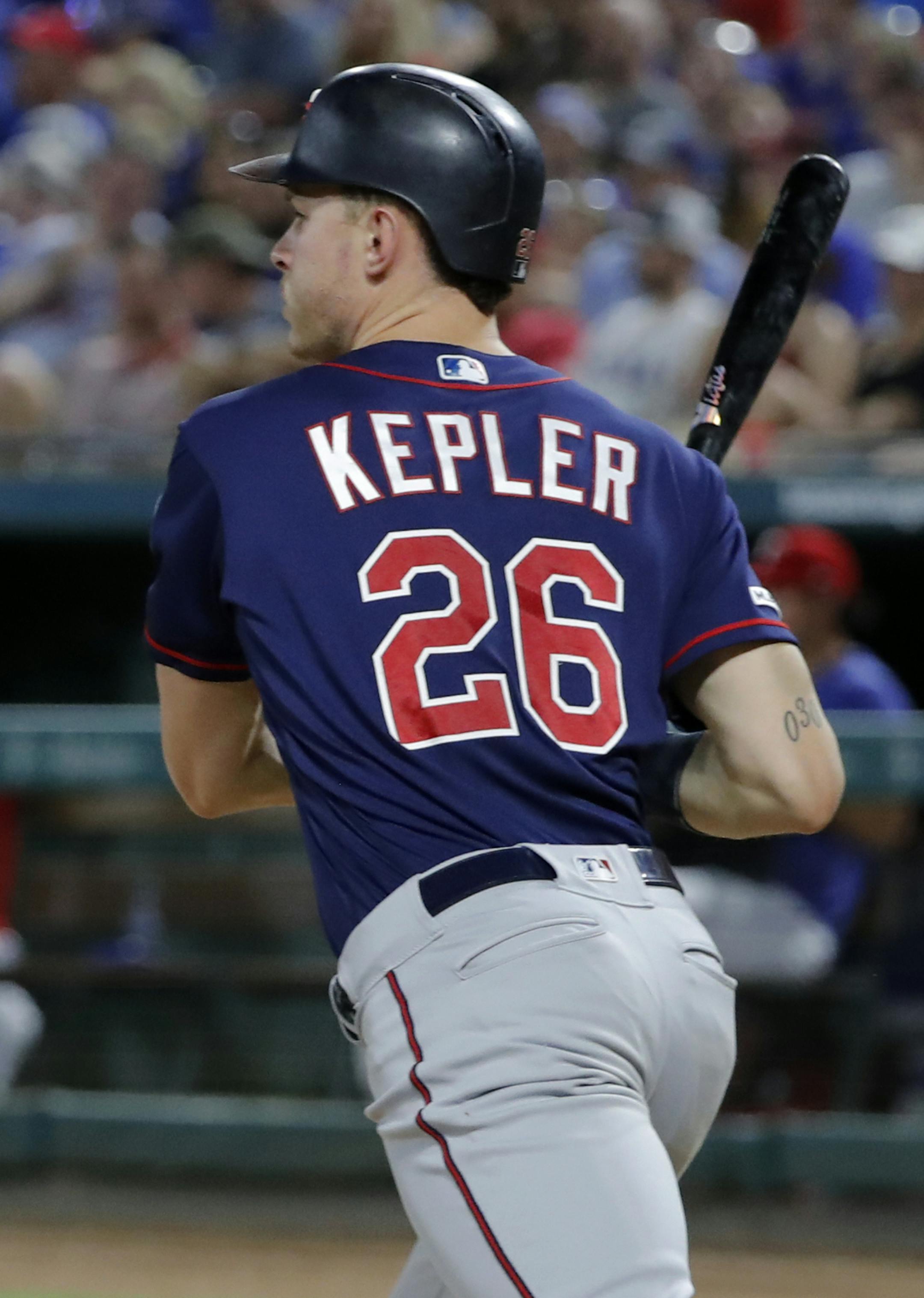 Minnesota Twins' Max Kepler follows through on an RBI single during the fifth inning of the team's baseball game against the Texas Rangers in Arlington, Texas, Saturday, Aug. 17, 2019. (AP Photo/Tony Gutierrez) ORG XMIT: MER51170efbe4fa8b1c054afc3ca7a6d