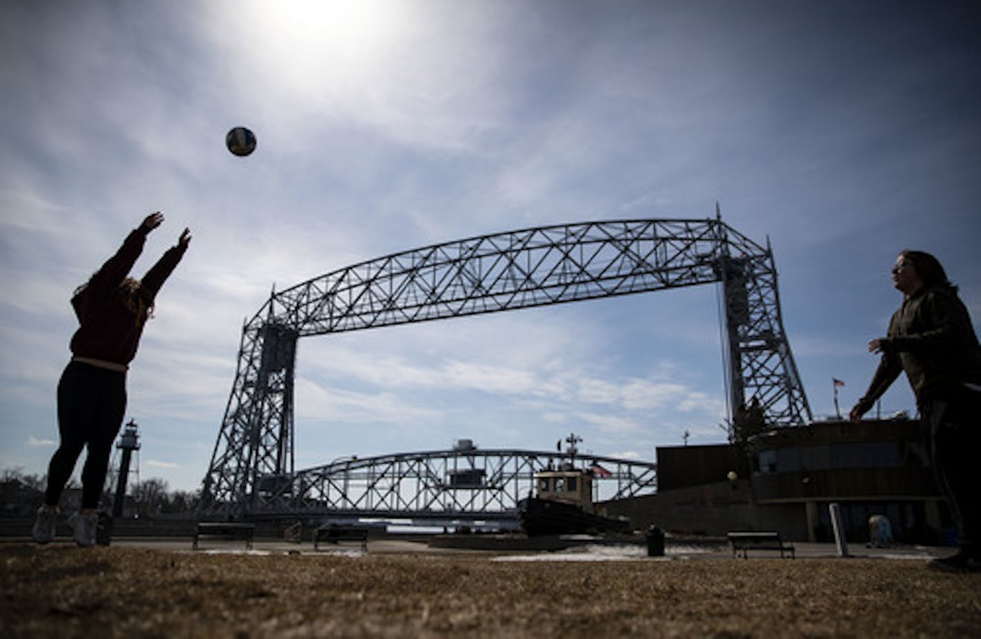 (Left) Zoe and Anthony Turan played volleyball in Canal Park on Monday afternoon. The Turans are from Minneapolis and decided to travel up the North Shore on Monday after being stuck inside for a week during the COVID-19 pandemic. They wanted to get outside while still being careful to practice social distancing. ]
ALEX KORMANN &#x2022; alex.kormann@startribune.com Duluth residents tried to find ways to get out of their homes while still social distancing on Monday March 23, 2020.