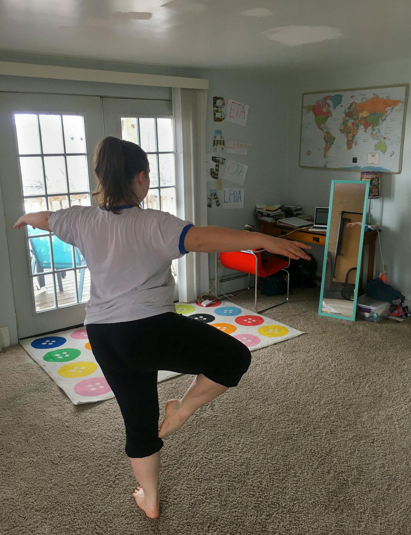 Anna Matthes, a senior studying musical theater at the University of Minnesota Duluth, taking one of her dance classes in her living room.