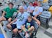 Mike Manning and his grandson Ethan, with Rosemount students, at CHS Field cheering on the Irish.