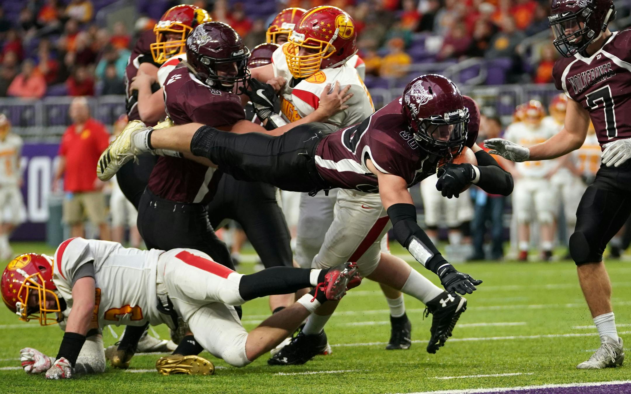 Mountain Lake's Drake Harder (80) dove in for a touchdown in the first quarter. ] RENEE JONES SCHNEIDER • renee.jones@startribune.com The State Football Tournament Class 9-man semi-finals between Mountain Iron-Buhl and Mountain Lake at U.S Bank Stadium in Minneapolis, Minn., on Friday, November 16, 2018.