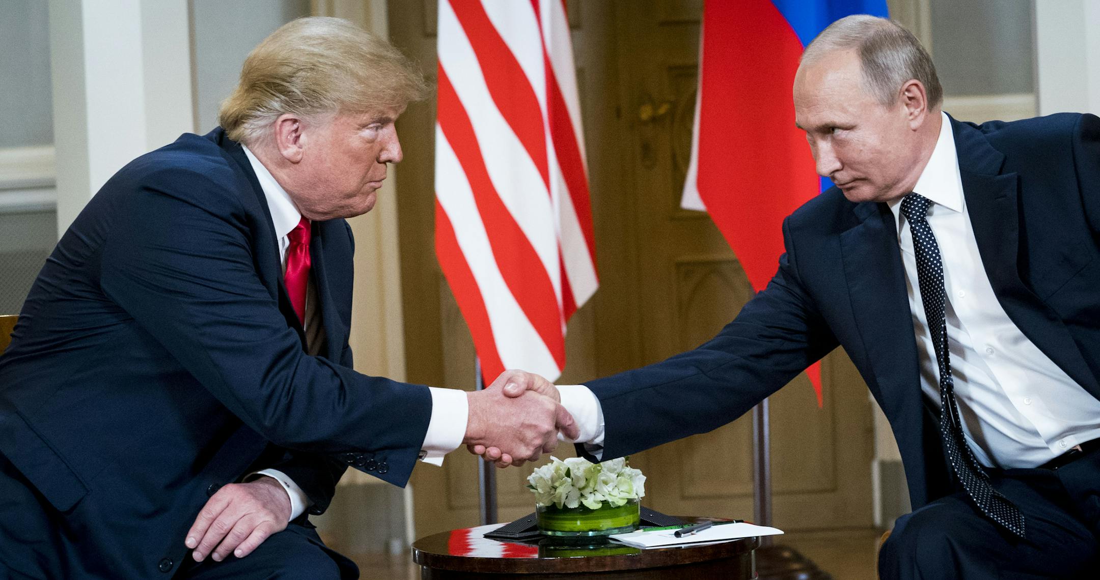 FILE -- President Donald Trump meets with President Vladimir Putin of Russia at the Presidential Palace in Helsinki, July 16, 2018. "The presidential oath of office contains 35 words and one core promise: to 'preserve, protect and defend the Constitution of the United States.' Since virtually the moment Donald J. Trump took that oath two years ago, he has been violating it," David Leonhardt writes. (Doug Mills/The New York Times)