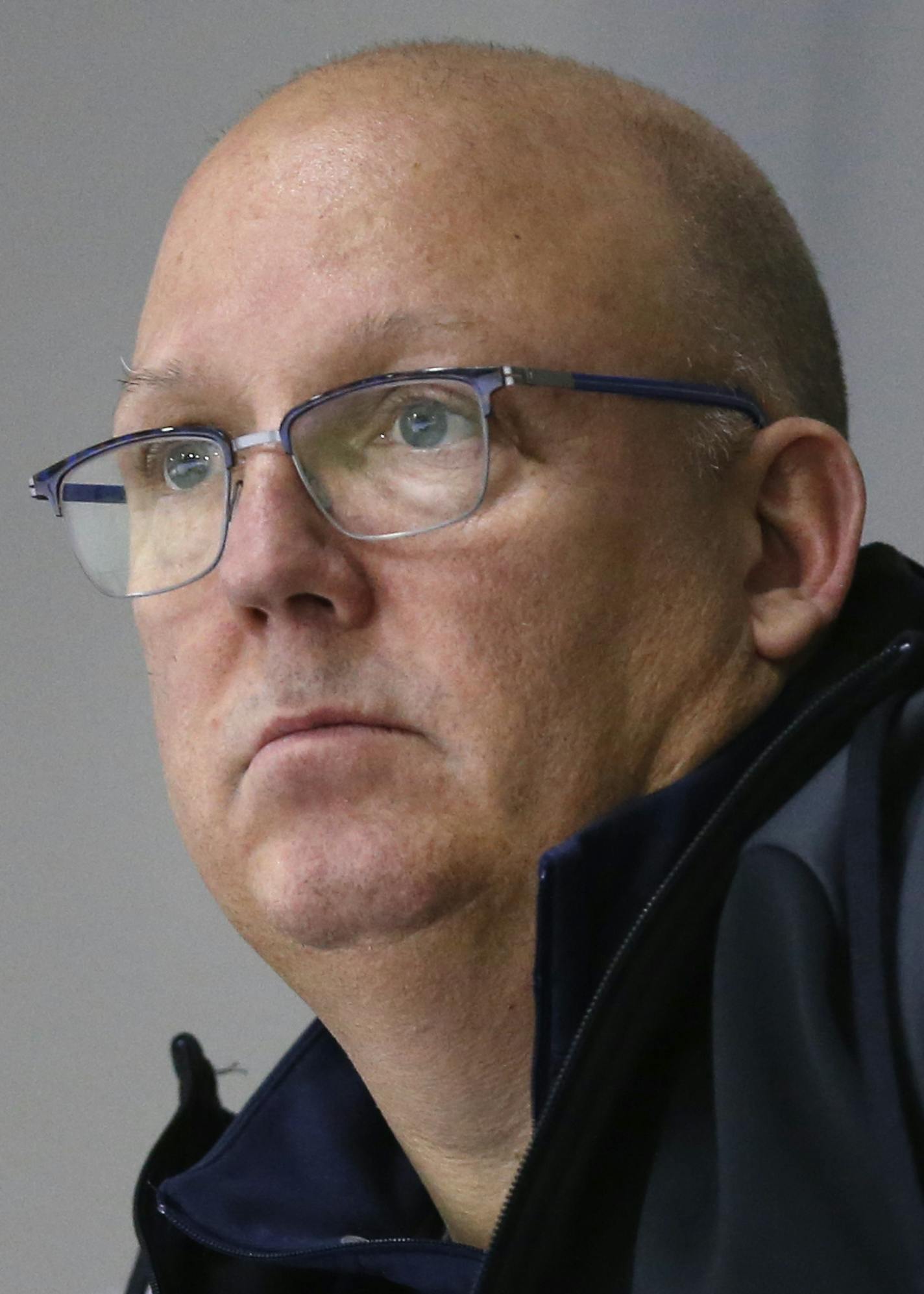 In this Sunday, Dec. 17, 2017 photo, United States' under-20 hockey coach Bob Motzko watches his team scrimmage during hockey practice in Columbus, Ohio. Expectations will be high when the US team defends its title on home soil at the World Junior tournament, starting the day after Christmas in Buffalo, N.Y. (AP Photo/Jay LaPrete) ORG XMIT: MIN2017122602013831 ORG XMIT: MIN1712260202449025