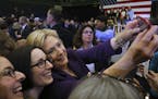 Hillary Clinton, a Democratic presidential hopeful, takes part in a selfie at a campaign event at Nashua Community College in Nashua, N.H., Feb. 2, 20