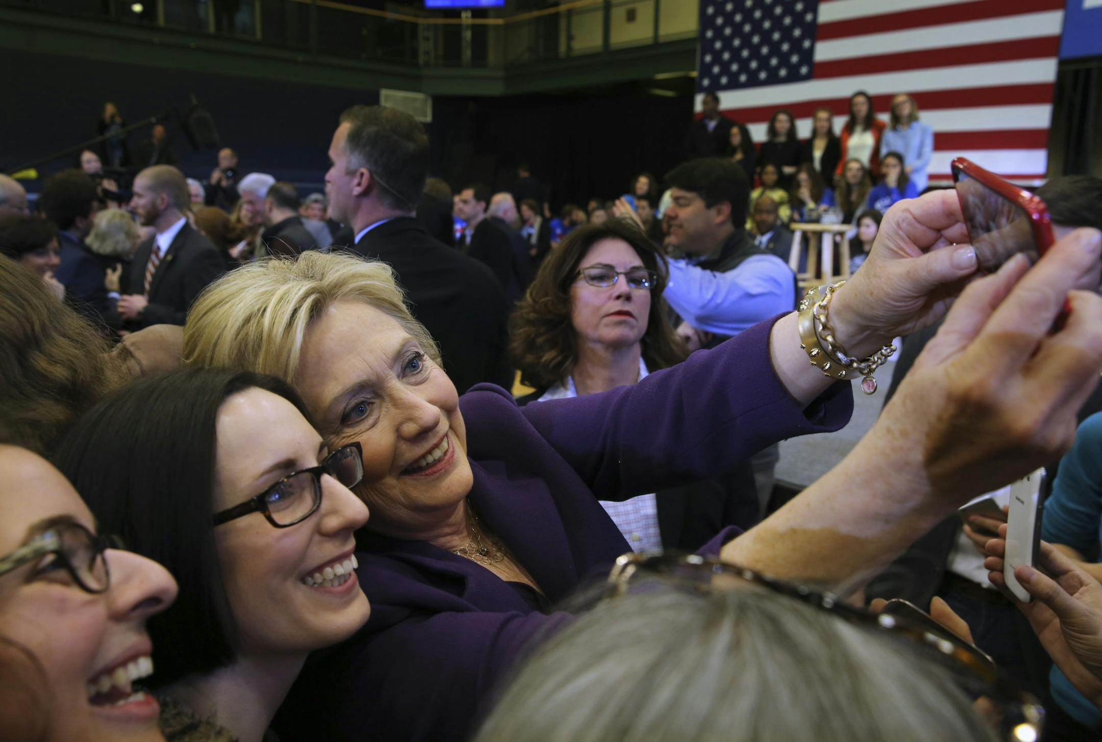 Hillary Clinton, a Democratic presidential hopeful, takes part in a selfie at a campaign event at Nashua Community College in Nashua, N.H., Feb. 2, 2016. Clinton was declared the winner of the Iowa caucuses on Tuesday after final vote counts showed her narrowly beating Sen. Bernie Sanders of Vermont, according to The Associated Press and other news organizations. (Richard Perry/The New York Times)
