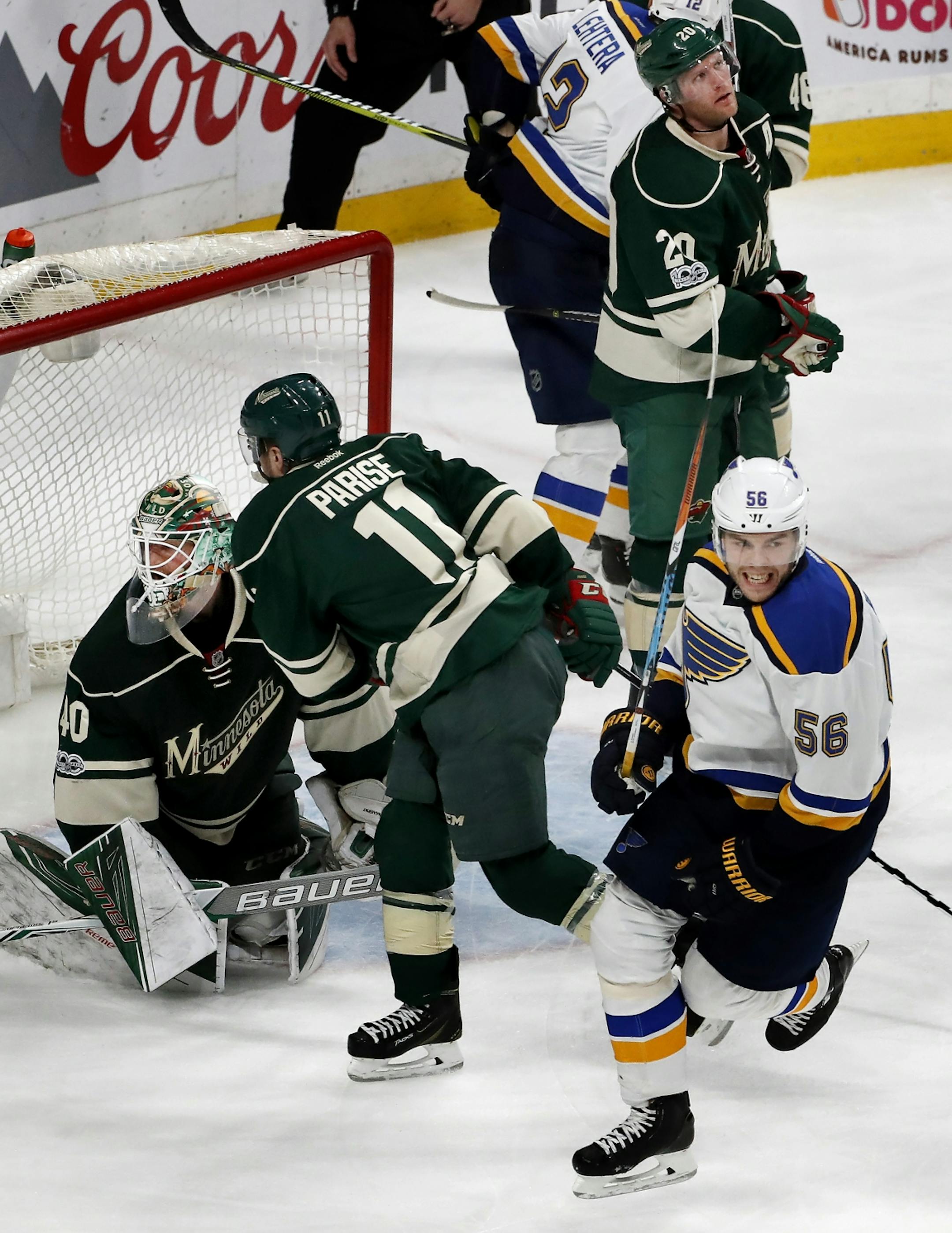 Magnus Paajarvi (56) celebrated after he shot the puck past Minnesota Wild goalie Devan Dubnyk (40) for the game-winning goal in overtime.