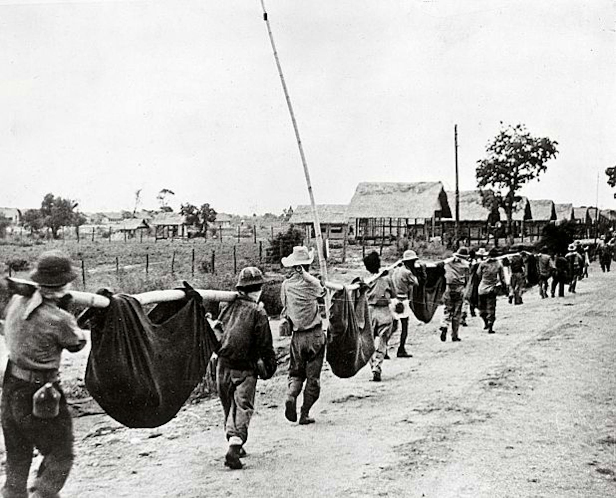 The photo, thought to be of the Bataan Death March, actually was an Allied POW burial detail. Following a six-month investigation, The AP corrected the caption in 2010, 65 years after the image was first published.