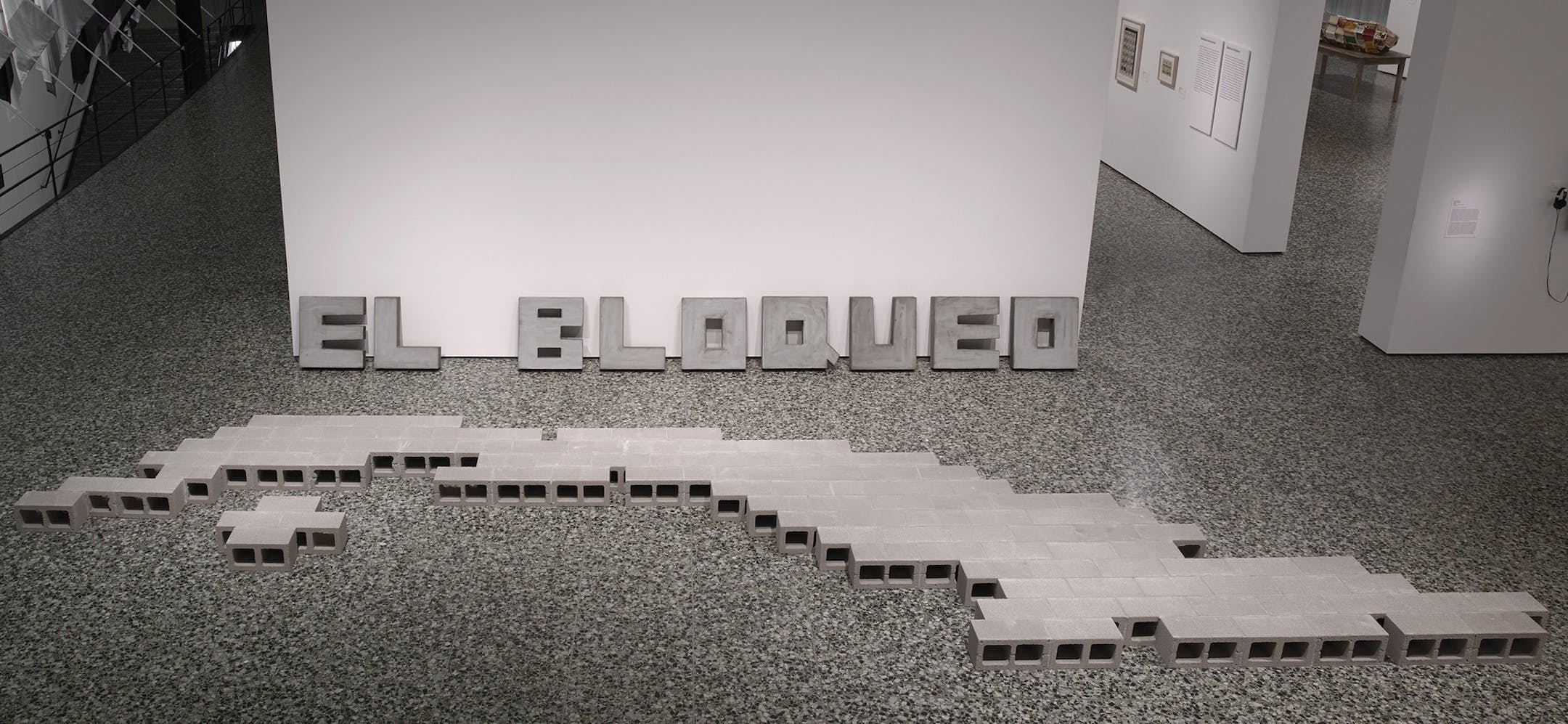 Tonel (Antonio Eligio Fern·ndez), El bloqueo (The Blockade/The Embargo), 1989, concrete blocks, cement, sand, ground stone, cast concrete letters, courtesy of the artist, Collection of the Museo Nacional de Bellas Artes de Habana and Daros Latinamerica Collection, Zurich. Image courtesy the Museum of Fine Arts, Houston, Will Michels, photographer