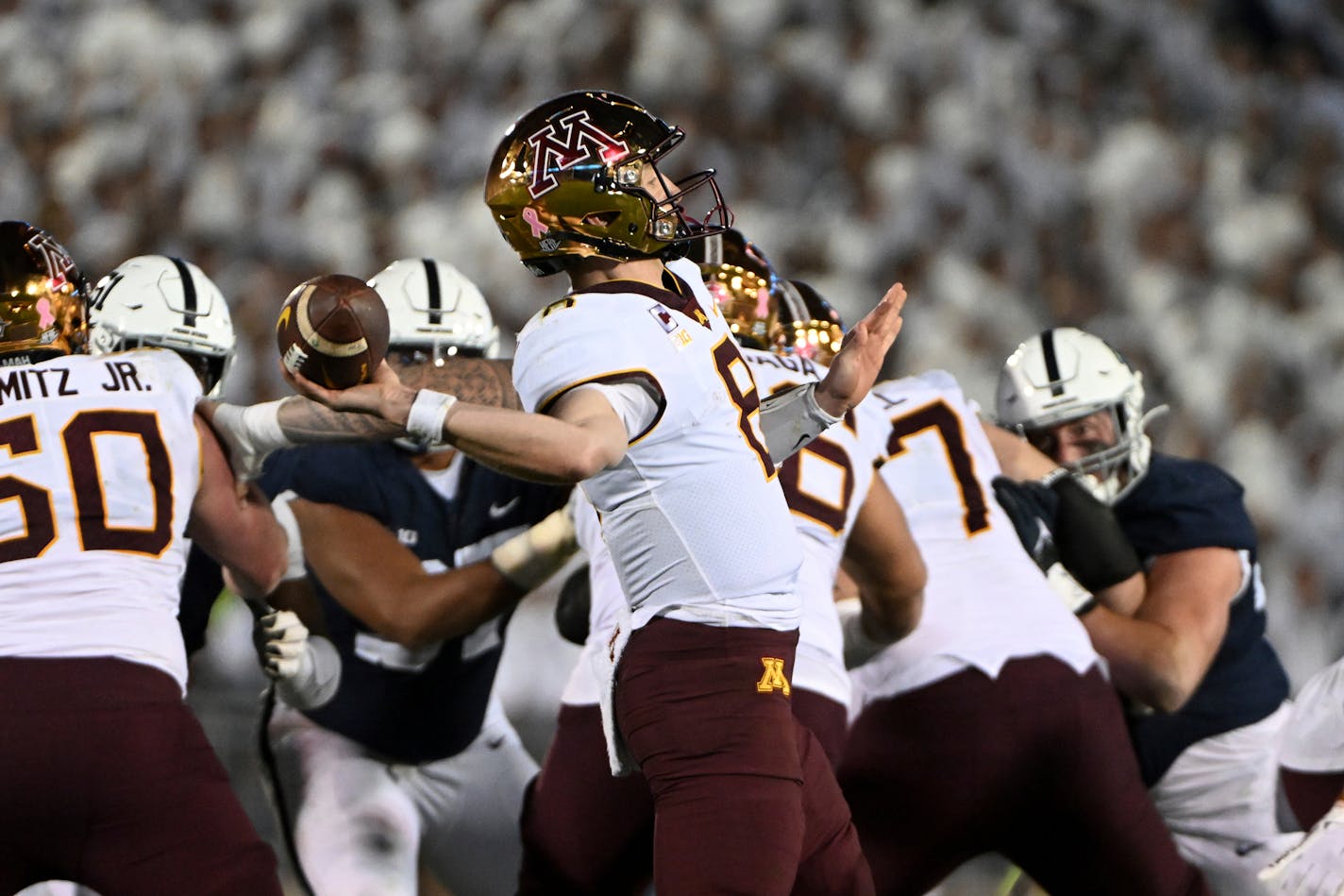 Minnesota quarterback Athan Kaliakmanis throws a pass against Penn State during the second half of an NCAA college football game, Saturday, Oct. 22, 2022, in State College, Pa. (AP Photo/Barry Reeger)