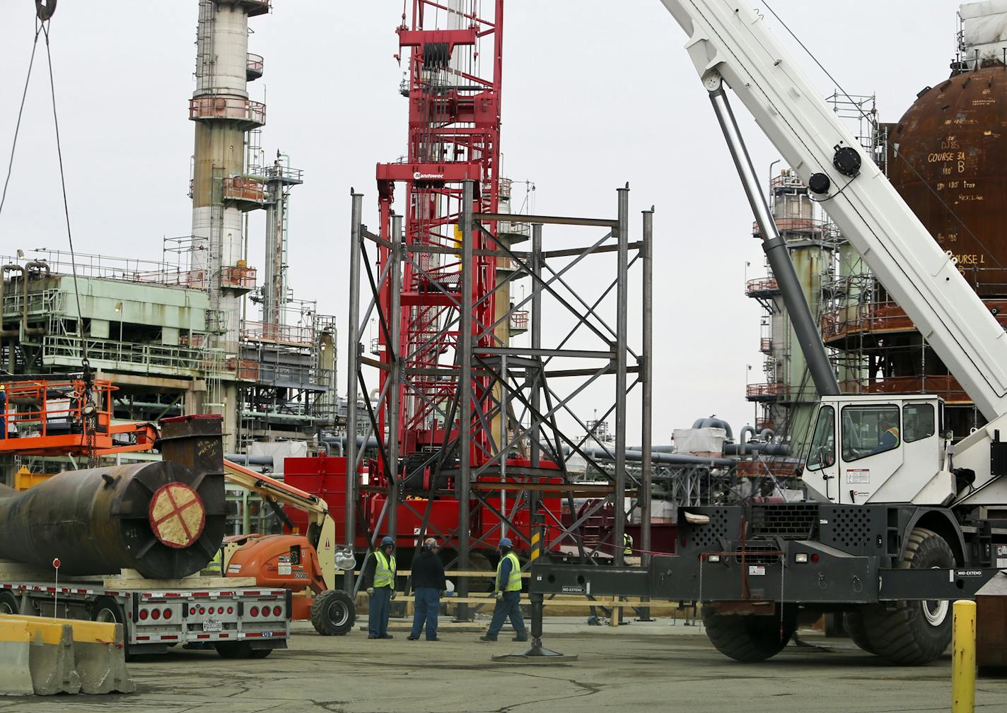 Flint Hills Refinery is undergoing a $400 million upgrade to improve its output and is announcing a $300 million energy-saving project, says it will begin generating half its electricity from waste heat. It also plans to install technology to produce fertilizer as a byproduct when refining gasoline. Up to 2000 additonal construction workers are onsite working on the projects.The Flint Hills Refinery was seenTuesday, March 18, 2014, in Inver Grove Heights, MN.](DAVID JOLES/STARTRIBUNE) djoles@sta