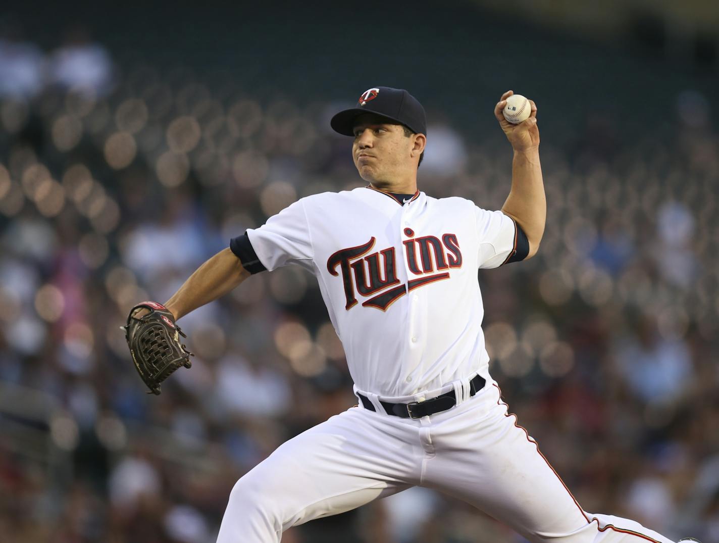 Minnesota Twins starting pitcher Tommy Milone throwing early in the game Monday night at Target Field.