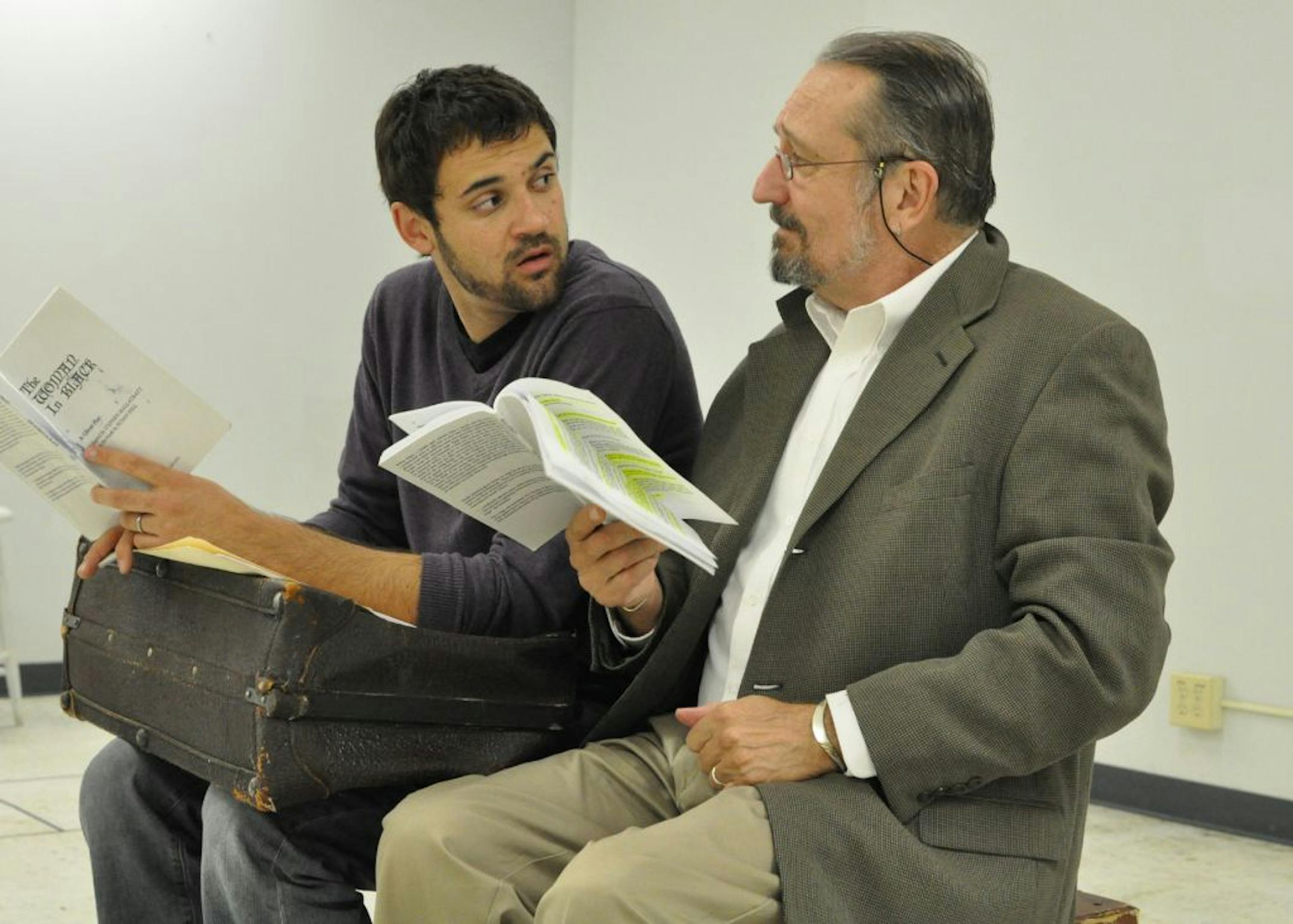 Kieran Adcock-Starr and Charles Numerich, both of St. Paul, rehearse for "The Woman in Black," the first play of the season for Chameleon Theatre Circle.