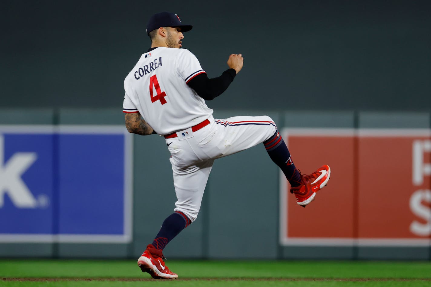 Minnesota Twins shortstop Carlos Correa converts a double play to end the baseball game with the Texas Rangers, Thursday, Aug. 24, 2023, in Minneapolis. The Twins won 7-5. (AP Photo/Bruce Kluckhohn)