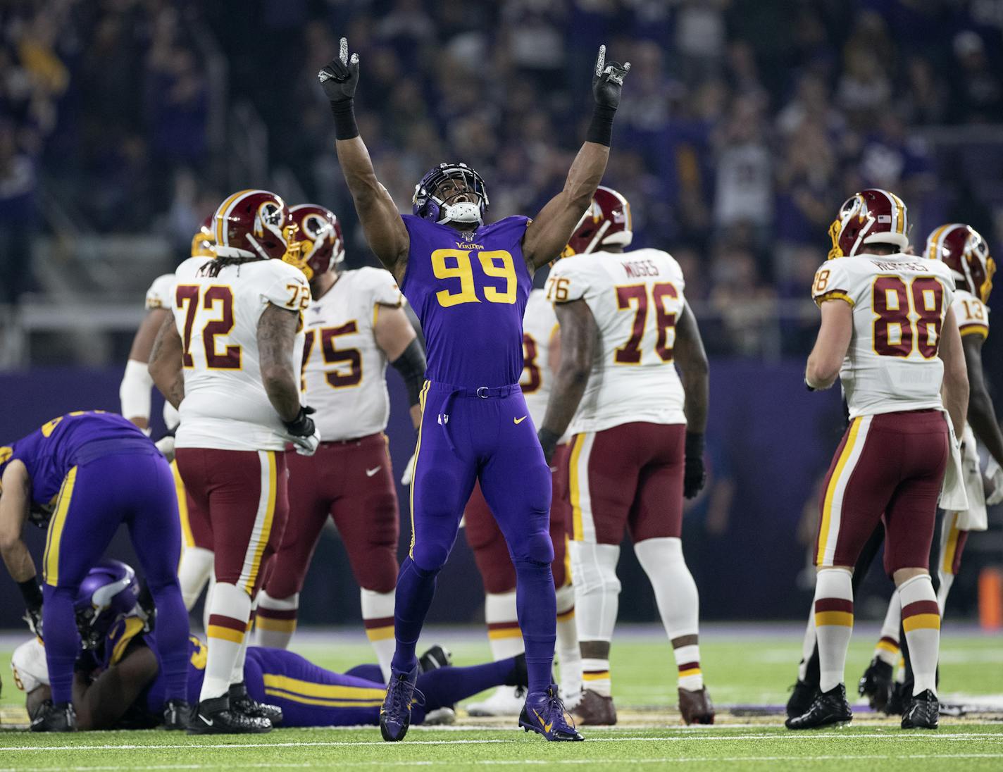 Minnesota Vikings defensive end Danielle Hunter (99) reacted after forcing a fumble against Washington Redskins quarterback Case Keenum (8) in the first quarter. ] CARLOS GONZALEZ &#xa5; Carlos.gonzalez@startribune.com The Minnesota Vikings played the Washington Redskins in an NFL game Thursday, Oct. 24, 2019 at U.S. Bank Stadium in Minneapolis.