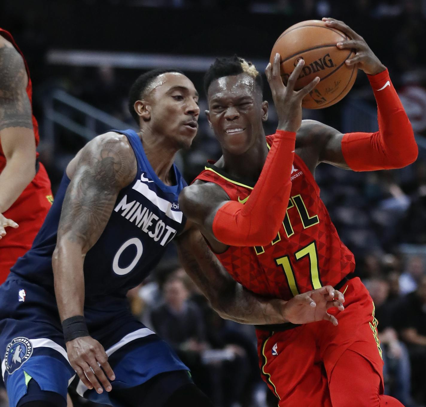 Atlanta Hawks guard Dennis Schroder (17) drives against Minnesota Timberwolves guard Jeff Teague (0) in the first half of an NBA basketball game Monday, Jan. 29, 2018, in Atlanta. (AP Photo/John Bazemore)