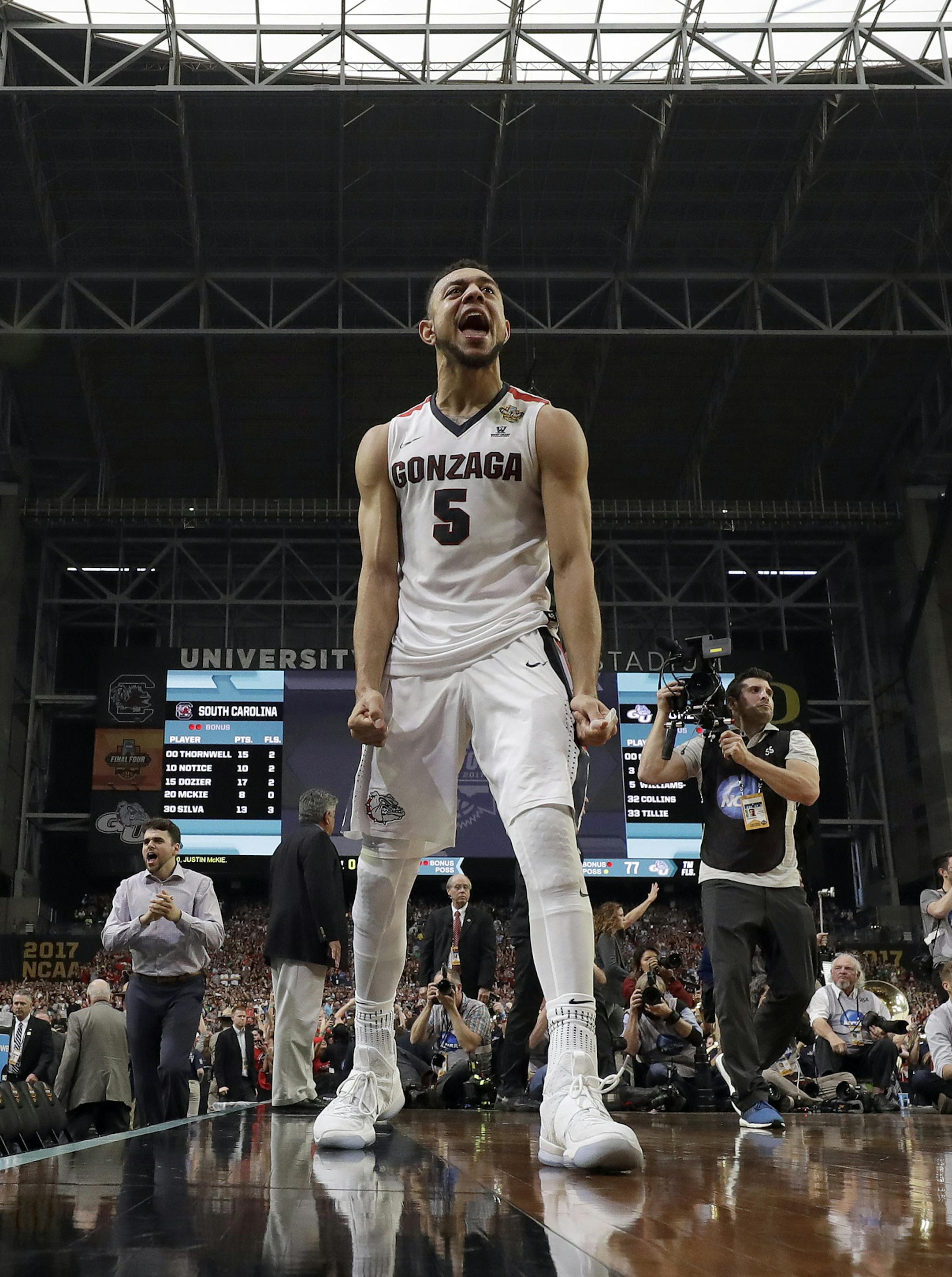 Gonzaga's Nigel Williams-Goss (5) celebrates after the semifinals of the Final Four NCAA college basketball tournament against South Carolina, Saturday, April 1, 2017, in Glendale, Ariz. Gonzaga won 77-73. (AP Photo/David J. Phillip)