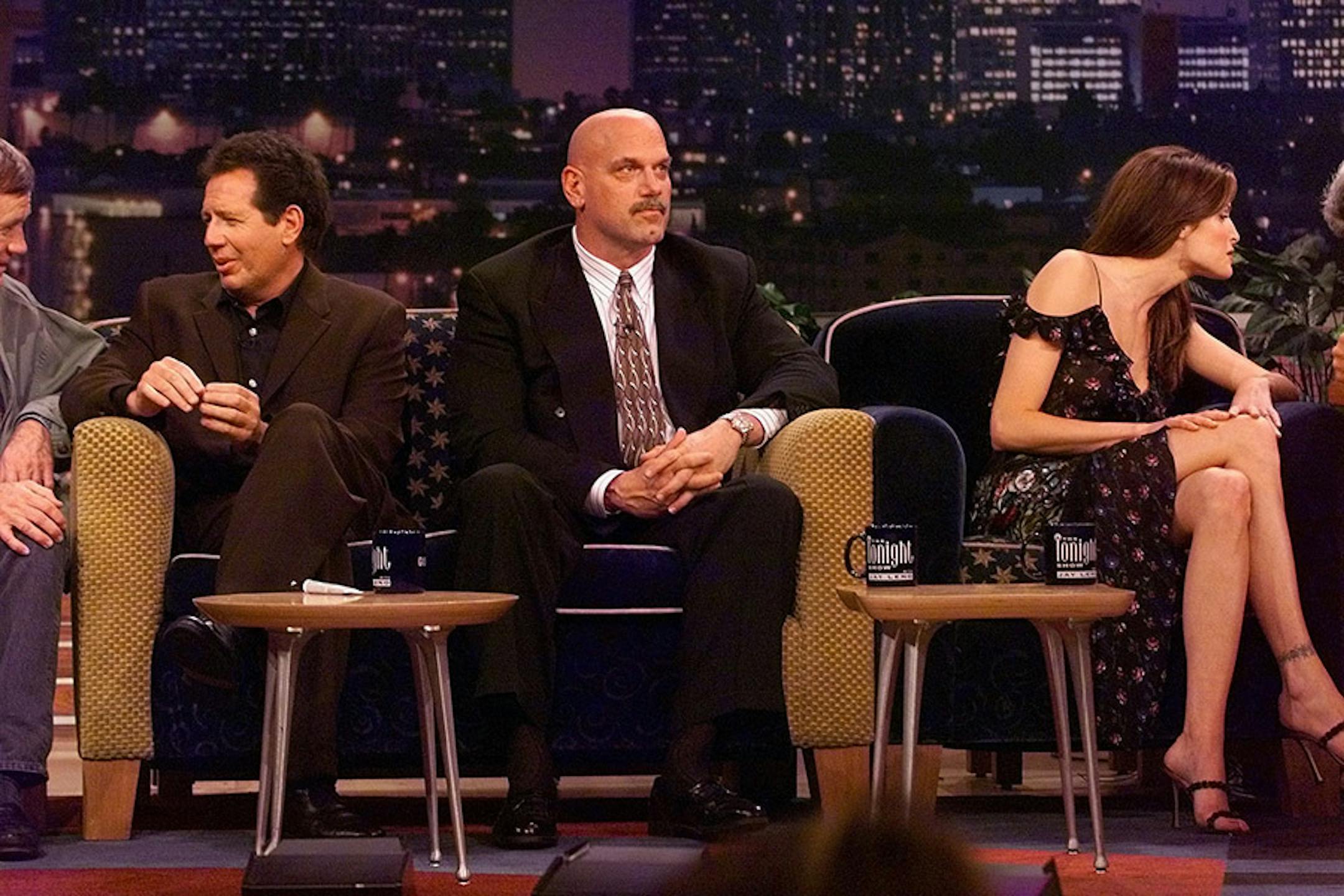 During a pause in the taping, Garry Shandling (l) chatted with a staff member, and model Stephanie Seymour (r) chatted with Leno, but Jesse Ventura was left to his own.