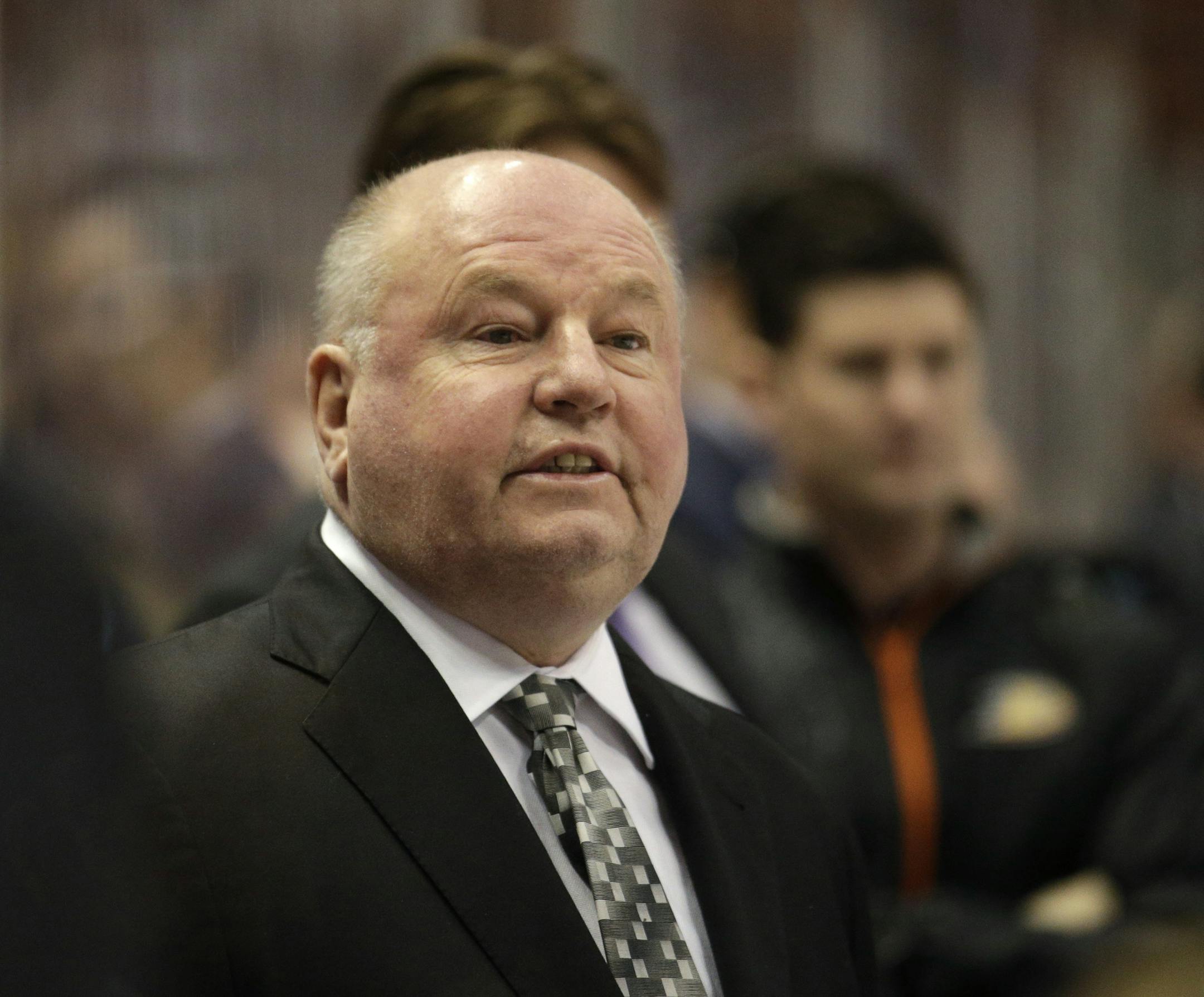 FILE - In this April 8, 2015 file photo, Anaheim Ducks head coach Bruce Boudreau coaches his team during the first period of an NHL hockey game against the Dallas Stars, in Anaheim, Calif. The Anaheim Ducks have fired coach Bruce Boudreau after their first-round exit from the playoffs. Ducks general manager Bob Murray announced the decision Friday, April 29, 2016. (AP Photo/Jae C. Hong, File)