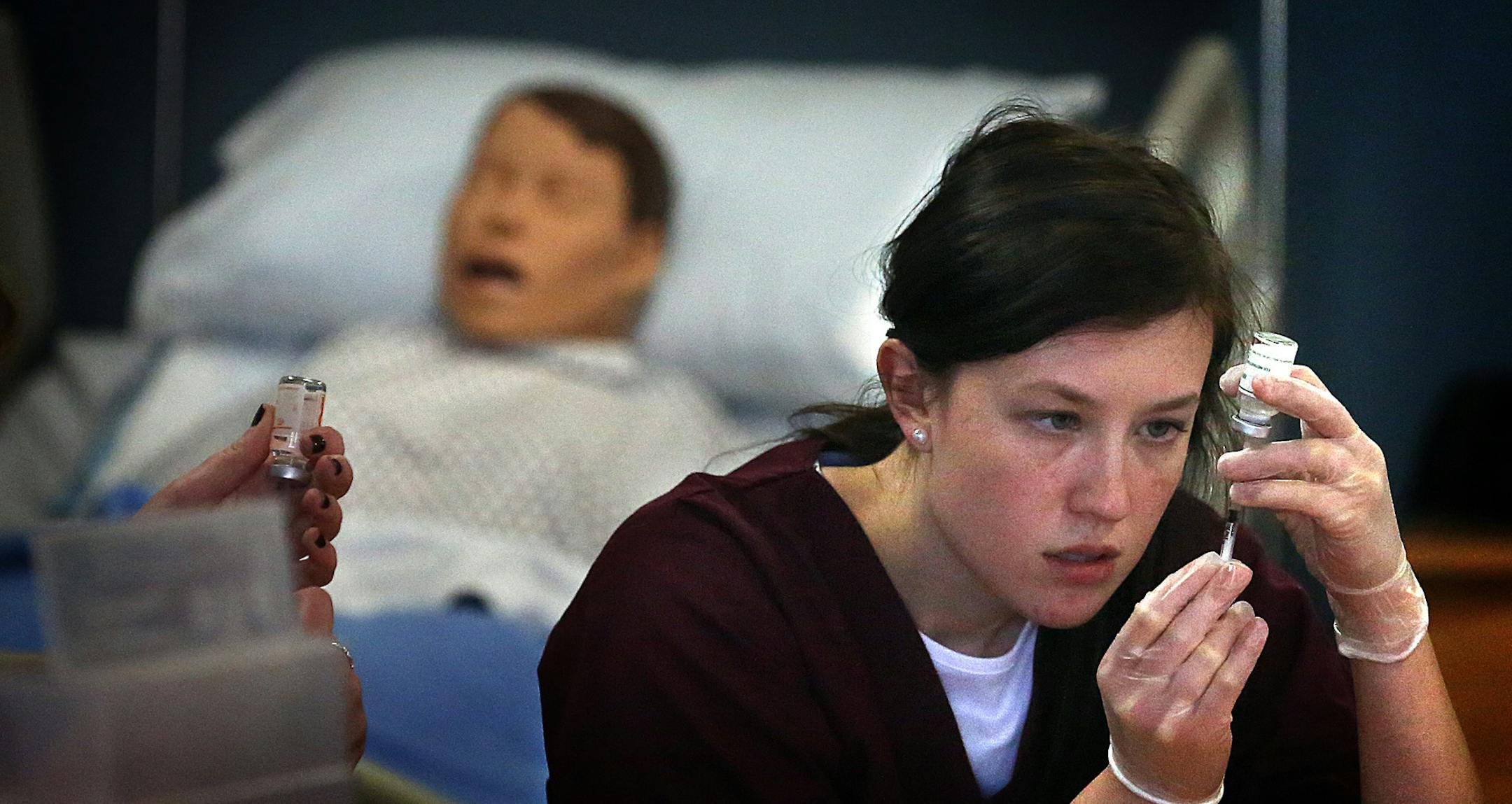 Nursing student Samantha Boucher studied proper injection techniques and procedures during class at the University of Minnesota. ] JIM GEHRZ ‚Ä¢ jgehrz@startribune.com / Minneapolis, MN / February 6, 2014 / 2:30 PM / BACKGROUND INFORMATION: Students will be working in class with mannequin patients at the Minnesota School of Nursing at the U of M.