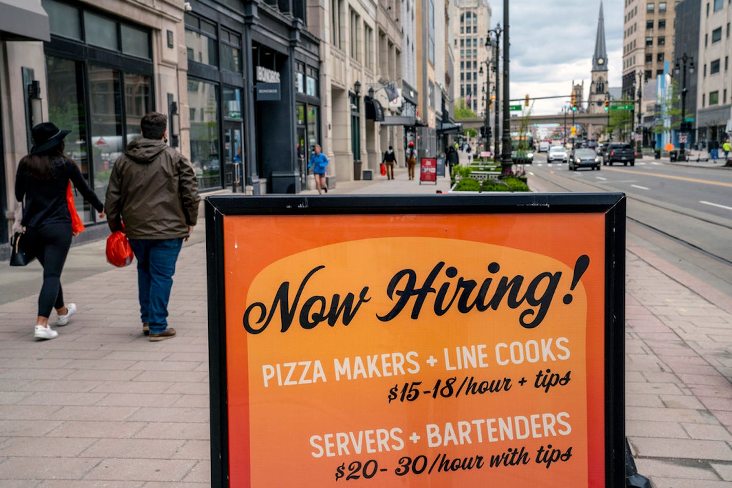 A sign advertising job openings at a restaurant in Detroit on Wednesday, May 5, 2021. Hiring in the hospitality and leisure sector was robust in April, but job growth over all was surprisingly weak. (Sarah Rice/The New York Times)