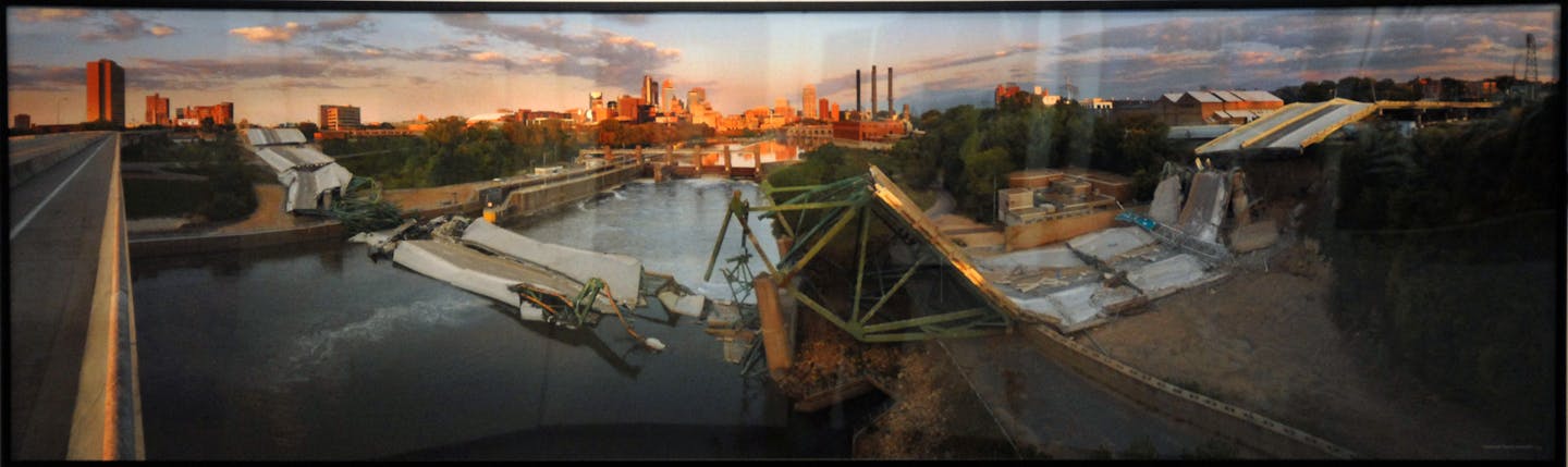 The disastrously pancaked I-35W bridge is the haunting centerpiece of a panoramic vista of Minneapolis' skyline in Chuck Arnold's photo "Collapse."