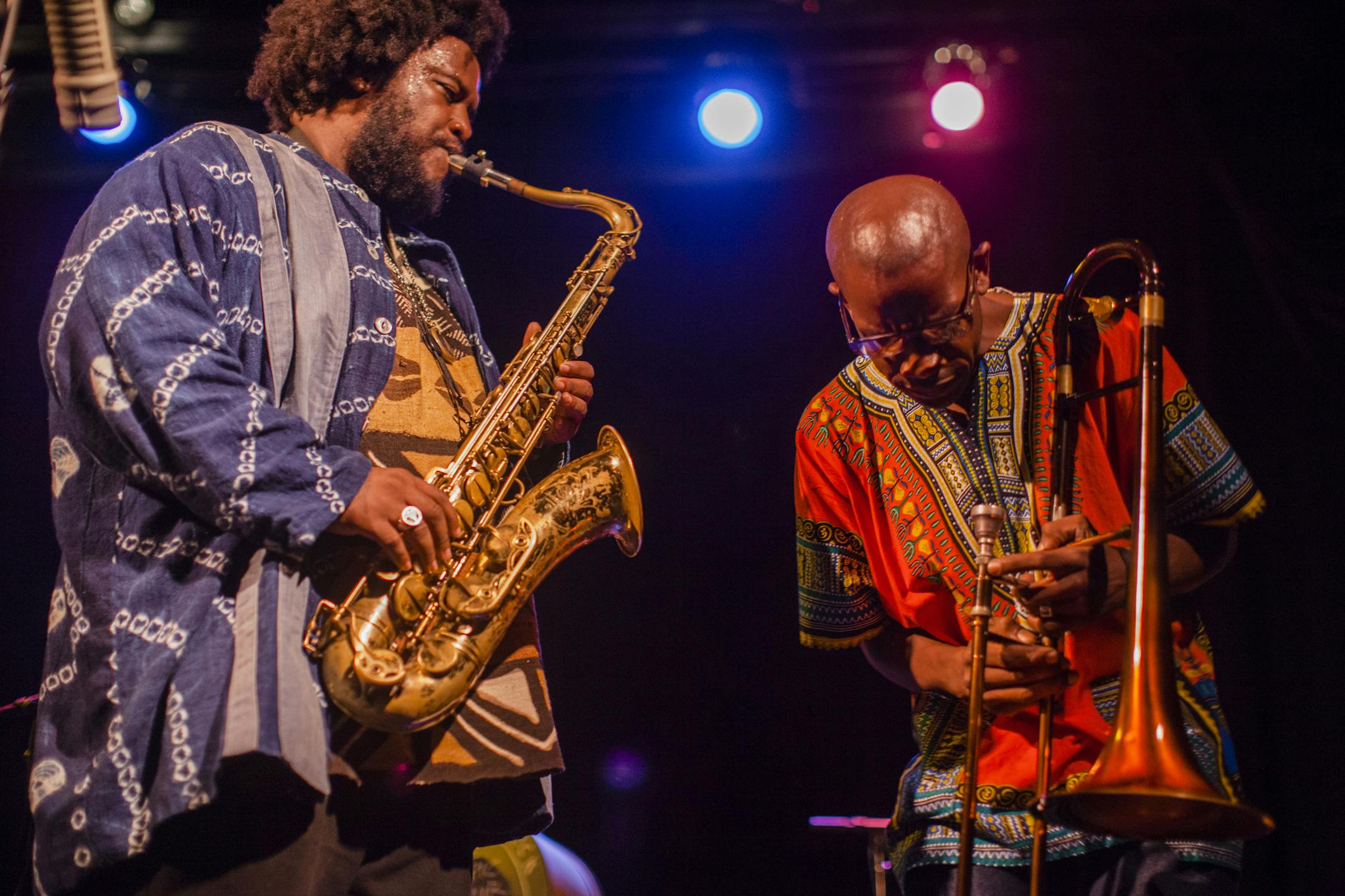 Kamasi Washington, left, and Ryan Porter of the West Coast Get Down play at the Bearsville Theater in Woodstock, N.Y., Aug. 19, 2015. From the year’s most talked-about jazz album to collaborations with Kendrick Lamar and Flying Lotus, Washington’s fame is growing by leaps and bounds in 2015. (Lauren Lancaster/The New York Times)