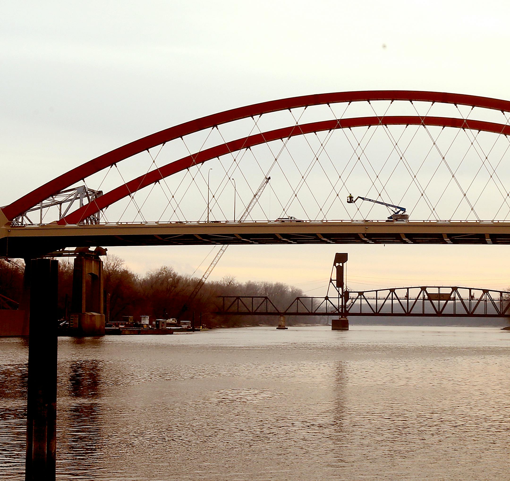 Final touches are being taken care of before the Hastings bridge opens both lanes on Sunday. The Hastings bridge is finally complete after years of construction and traffic is flowing across it. Officials are preparing to open both lanes in both directions for the first time on Sunday. Hastings, MN on November 8, 2013. ] JOELKOYAMA‚Ä¢joel koyama@startribune ORG XMIT: MIN1311080930519267