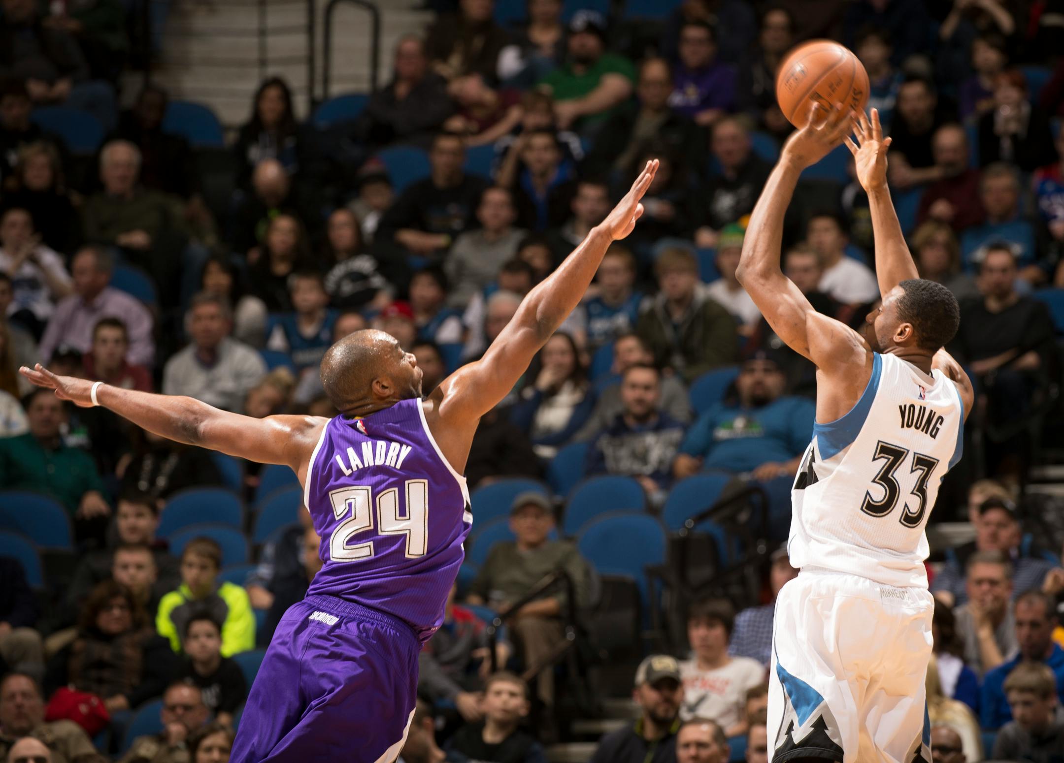 Minnesota Timberwolves forward Thaddeus Young (33) hits a jump shot over Sacramento Kings forward Carl Landry (24) during the second half.