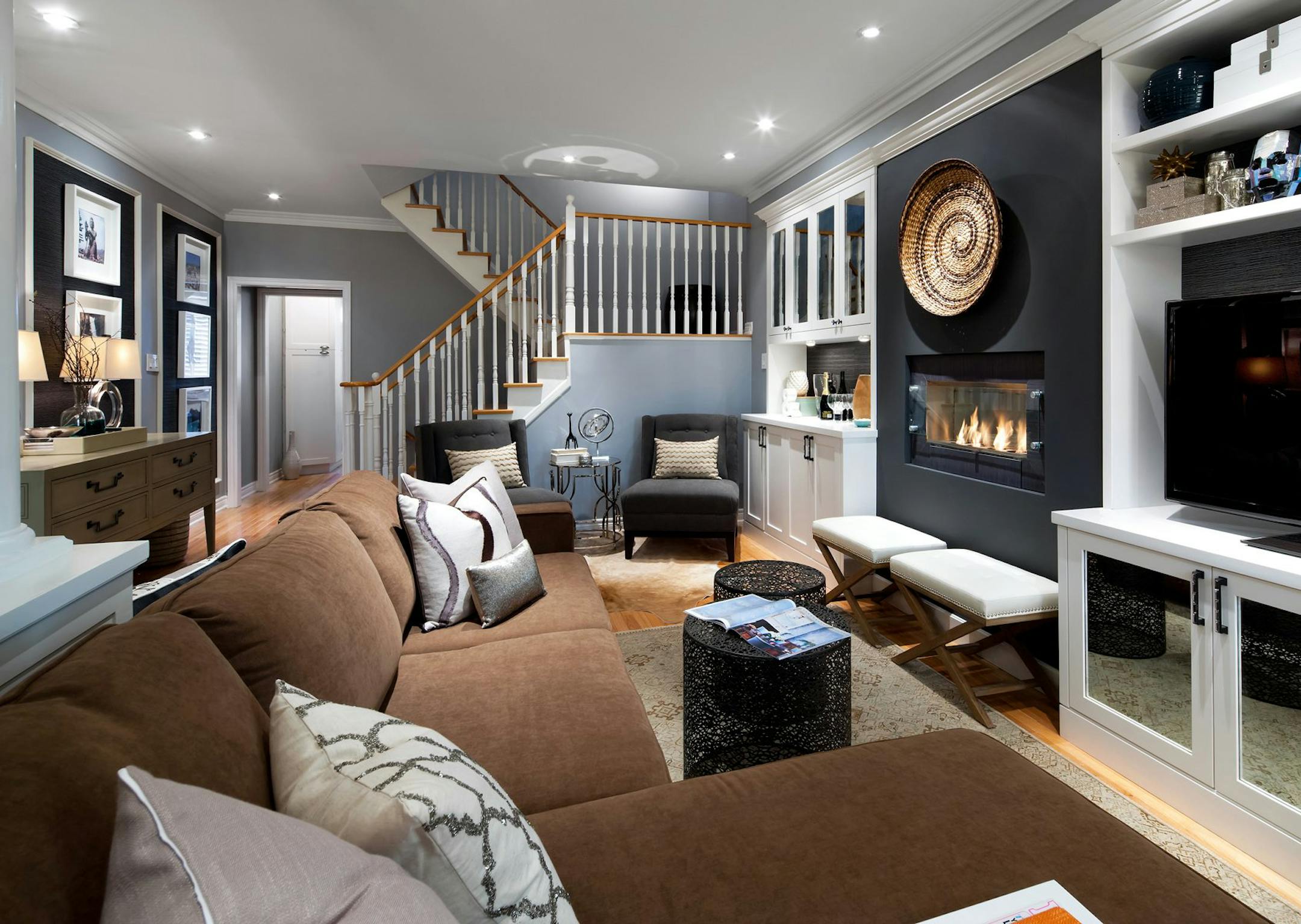 When it comes to providing comfort and a lot of seating, you can't beat a sectional sofa. We selected an L-shaped model and positioned it to face a new built-in media center. (Brandon Barre/MCT) ORG XMIT: 1148957