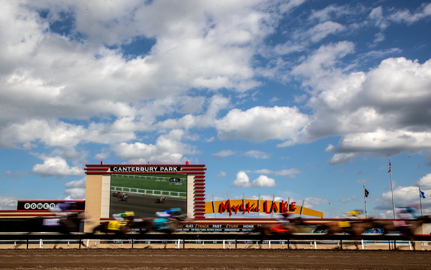 Horses ran for the finish line during the first race on Wednesday at Canterbury Park.