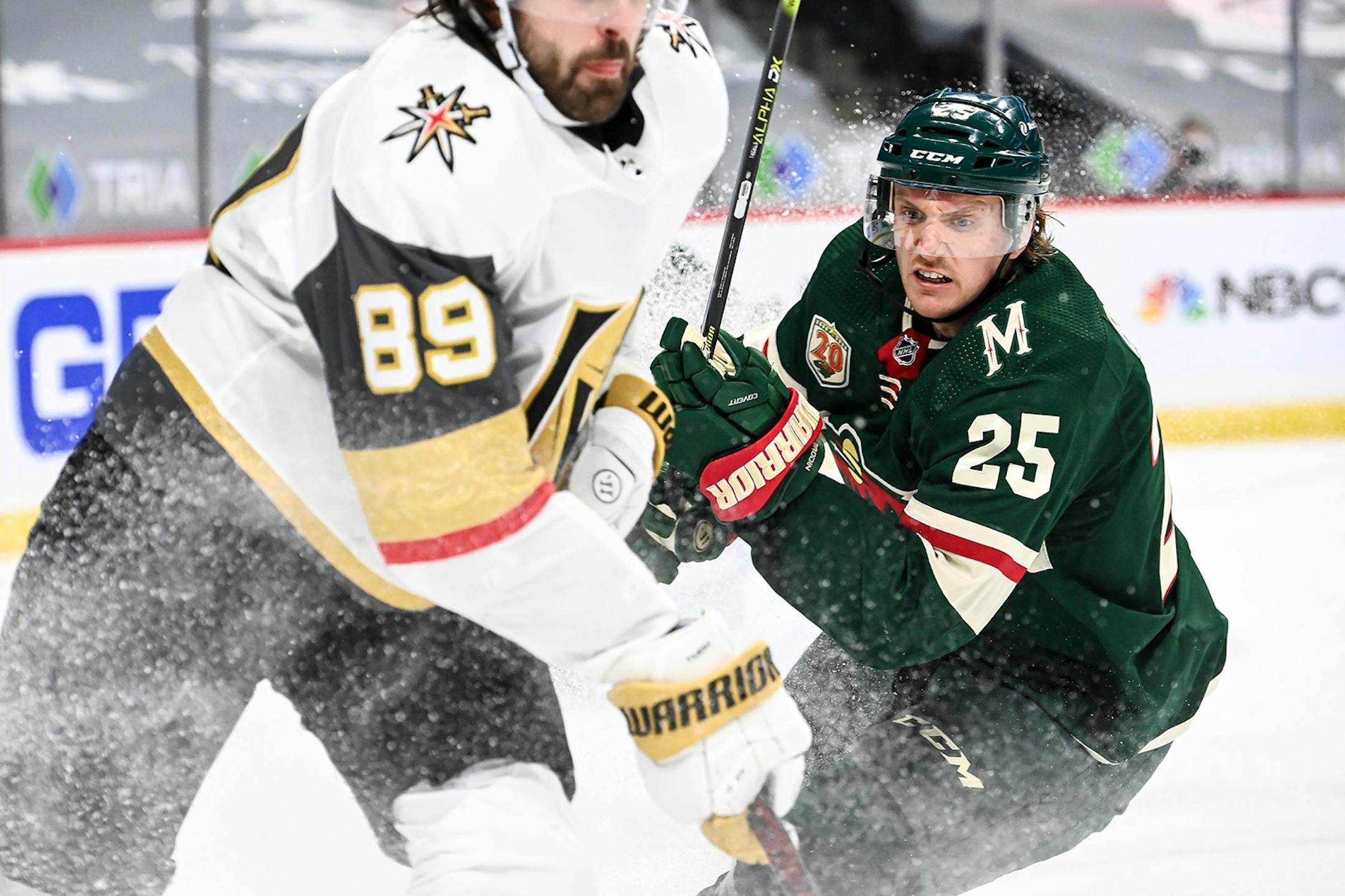 Minnesota Wild defenseman Jonas Brodin (25) guarded Vegas Golden Knights right wing Alex Tuch (89) in the second period.