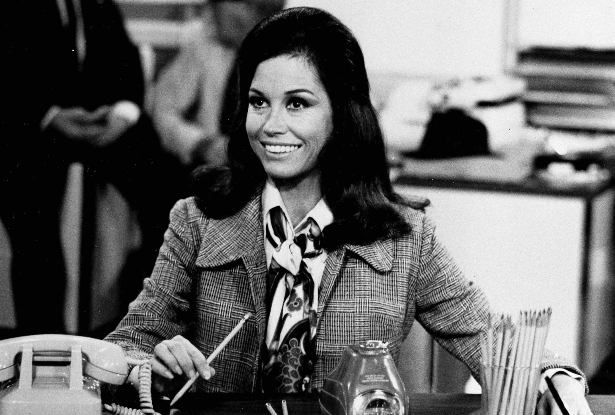 Actress Mary Tyler Moore is shown as TV news producer Mary Richards in a scene from the "The Mary Tyler Moore Show," Aug. 1970 (AP Photo) ORG XMIT: APHS326011 ORG XMIT: MIN1610171748271659