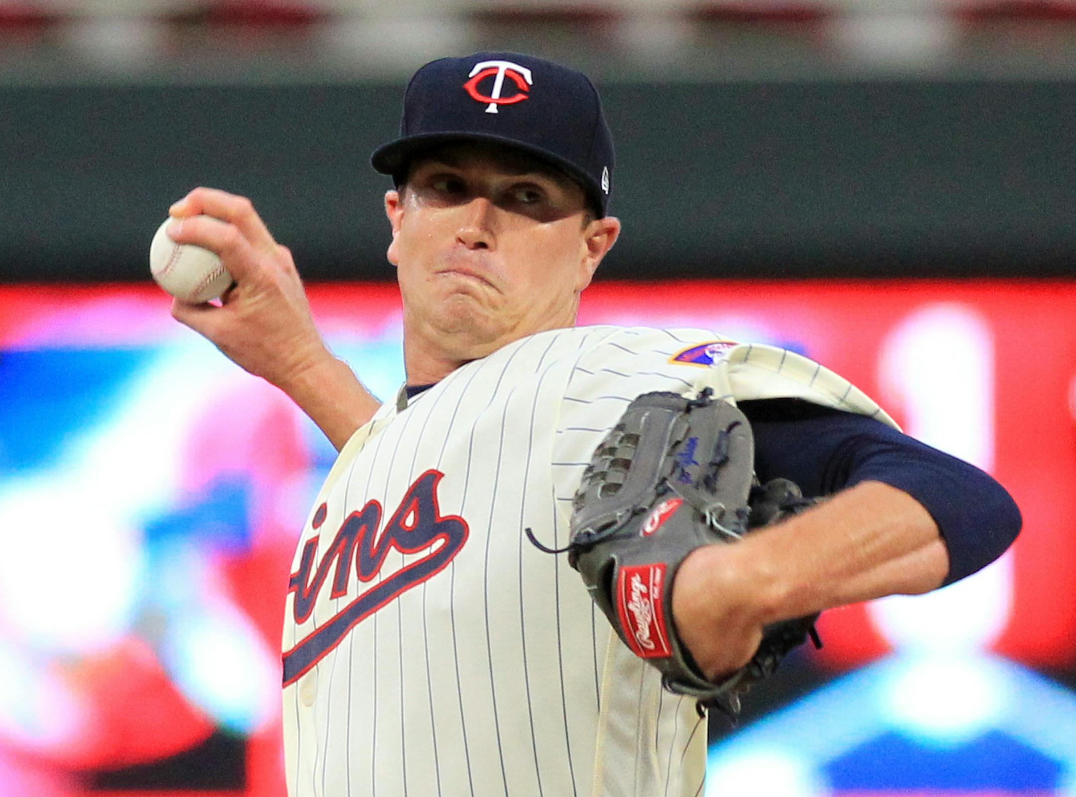 Minnesota Twins pitcher Kyle Gibson throws to the Texas Rangers in the first inning during a baseball game on Saturday, Aug. 5, 2017 in Minneapolis. (AP Photo/Andy Clayton-King)