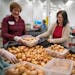 Volunteers packaged onions at Second Harvest Heartland in Brooklyn Park in January.