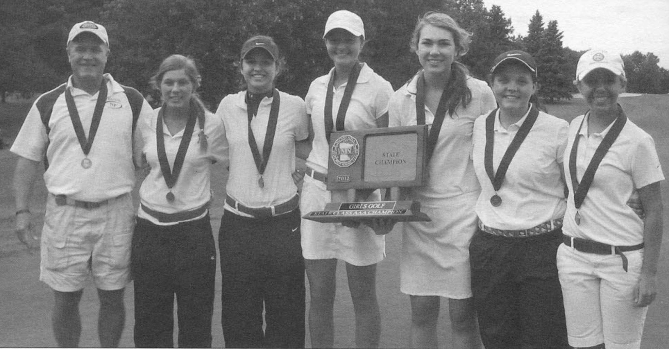 Matt Shetka with his state champion 2012 New Prague High School golf team.