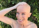 Kathy Griffin shows off her shaved head.