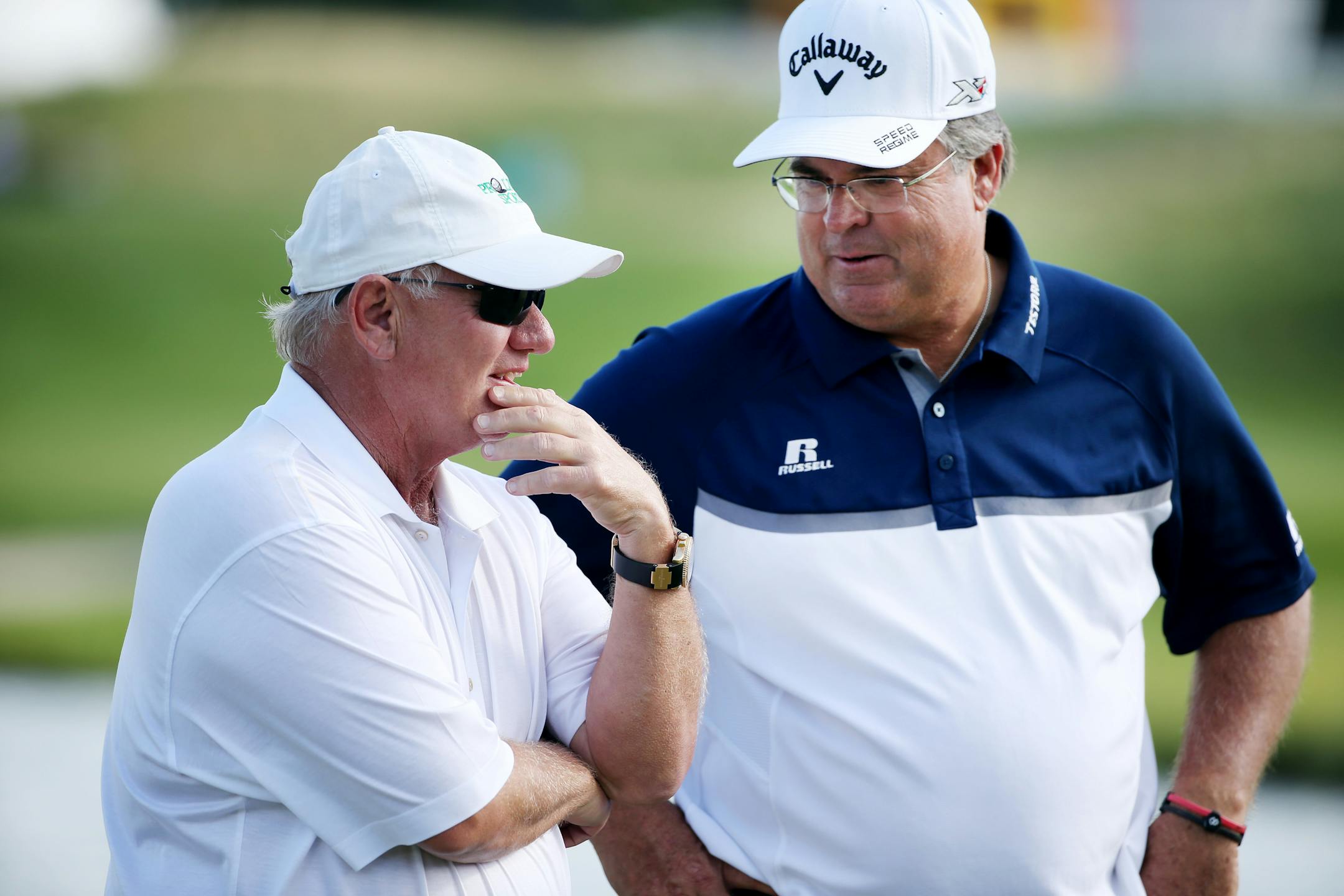 Hollis Cavner, left, founder and director of the 3M Championship, talked with winner Kenny Perry at TPC Twin Cities in Blaine on Sunday.