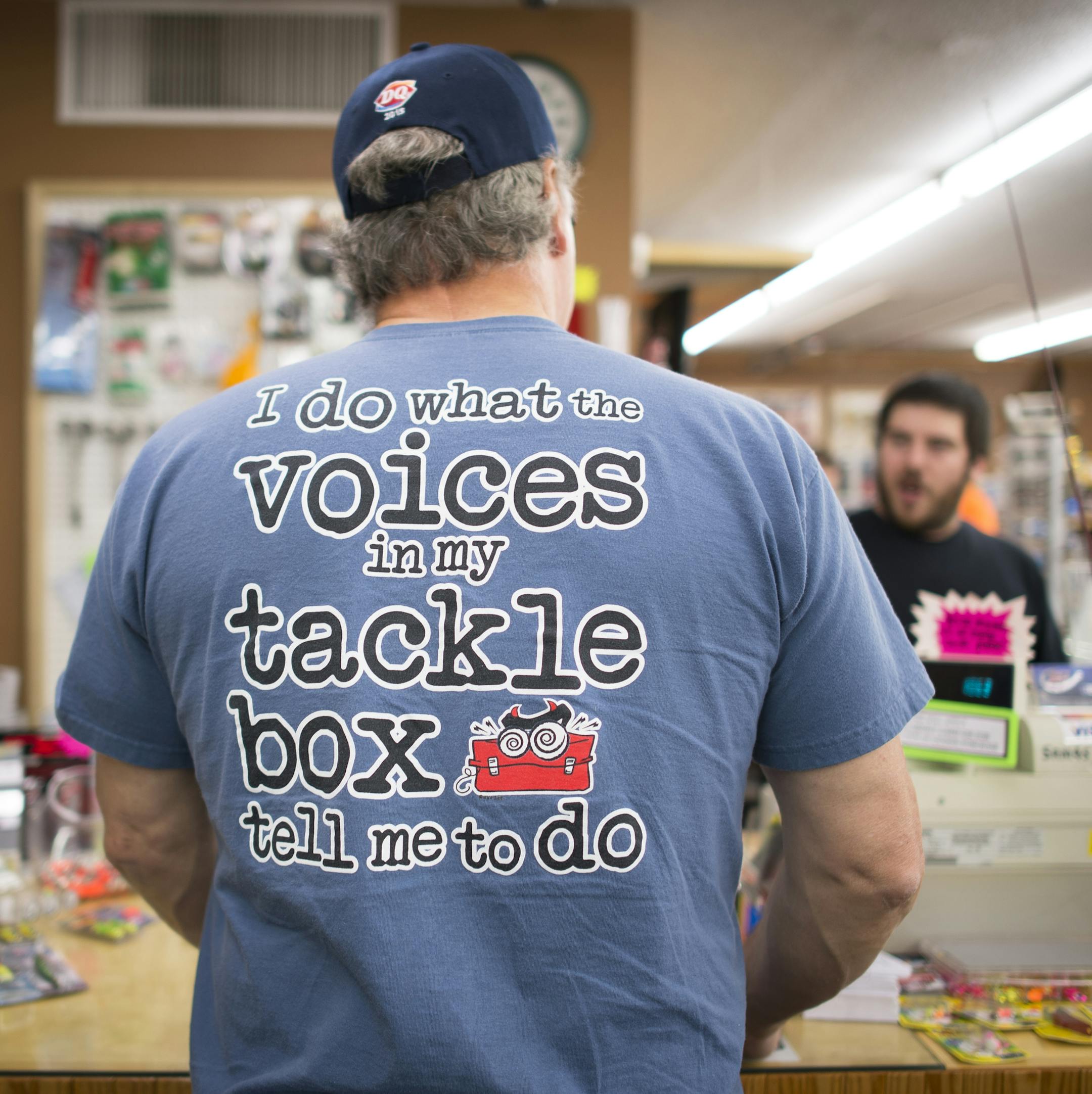 An angler buying bait at Mike's Bait on 8 dressed the part for an afternoon of fishing on Saturday. ] Aaron Lavinsky • aaron.lavinsky@startribune.com Minnessentials story on Mike's Bait on 8, a locale that provides not only minnows and crawlers, but advice, success stories and community. The shop was photographed Saturday, May 23, 2015 in Forest Lake Park.