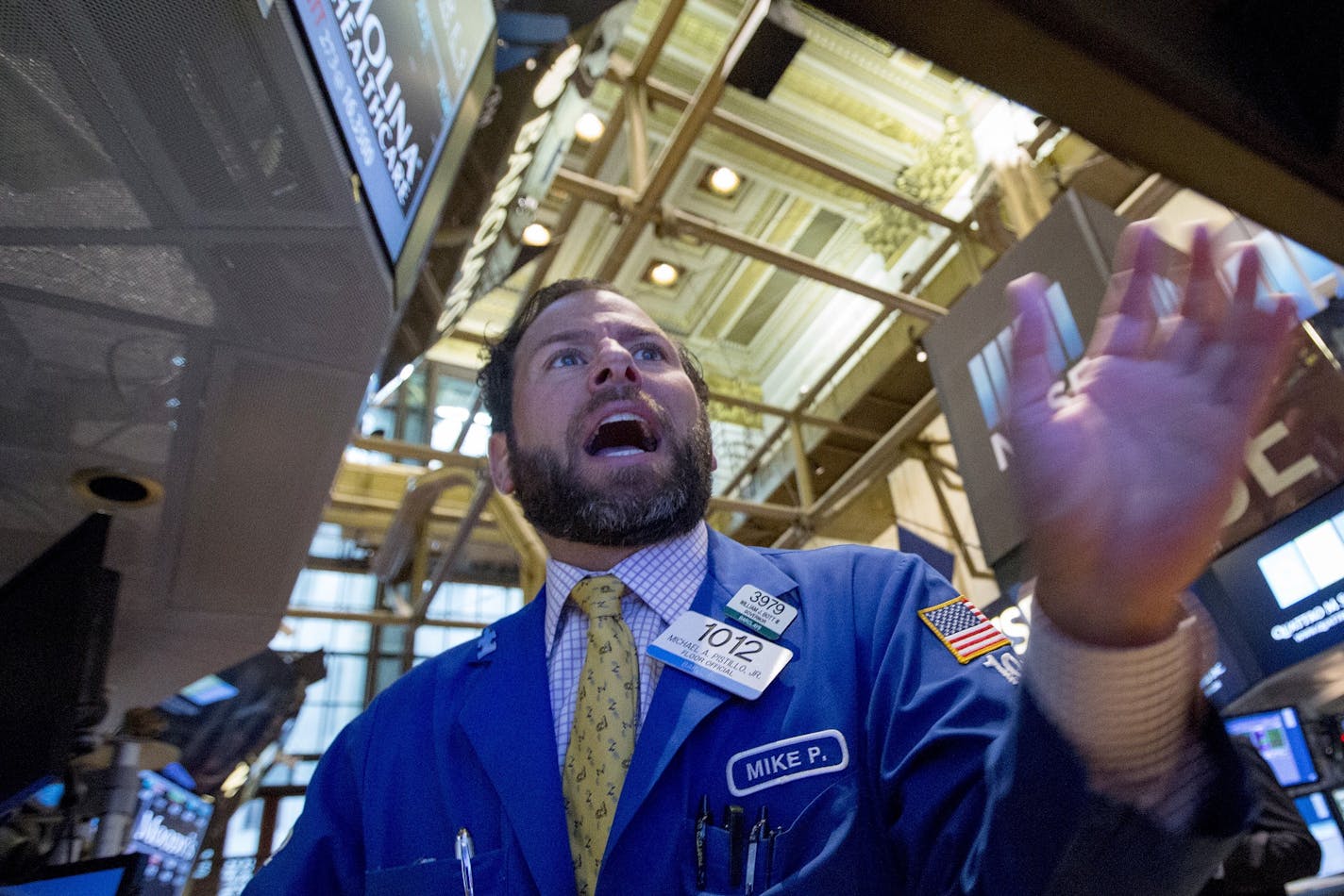 A trader works on the floor of the New York Stock Exchange August 24, 2015. REUTERS/Brendan McDermid