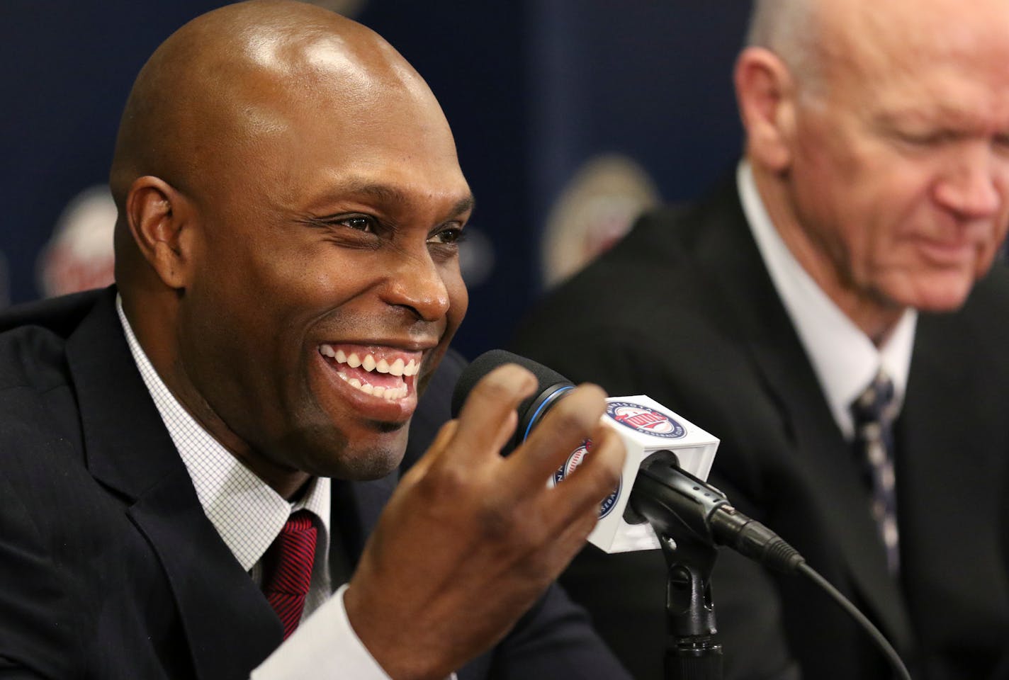 Former Twins outfielder Torii Hunter with Twins General Manager Terry Ryan. Hunter plans on returning to the Twin Cities next month when the Red Sox are in town.