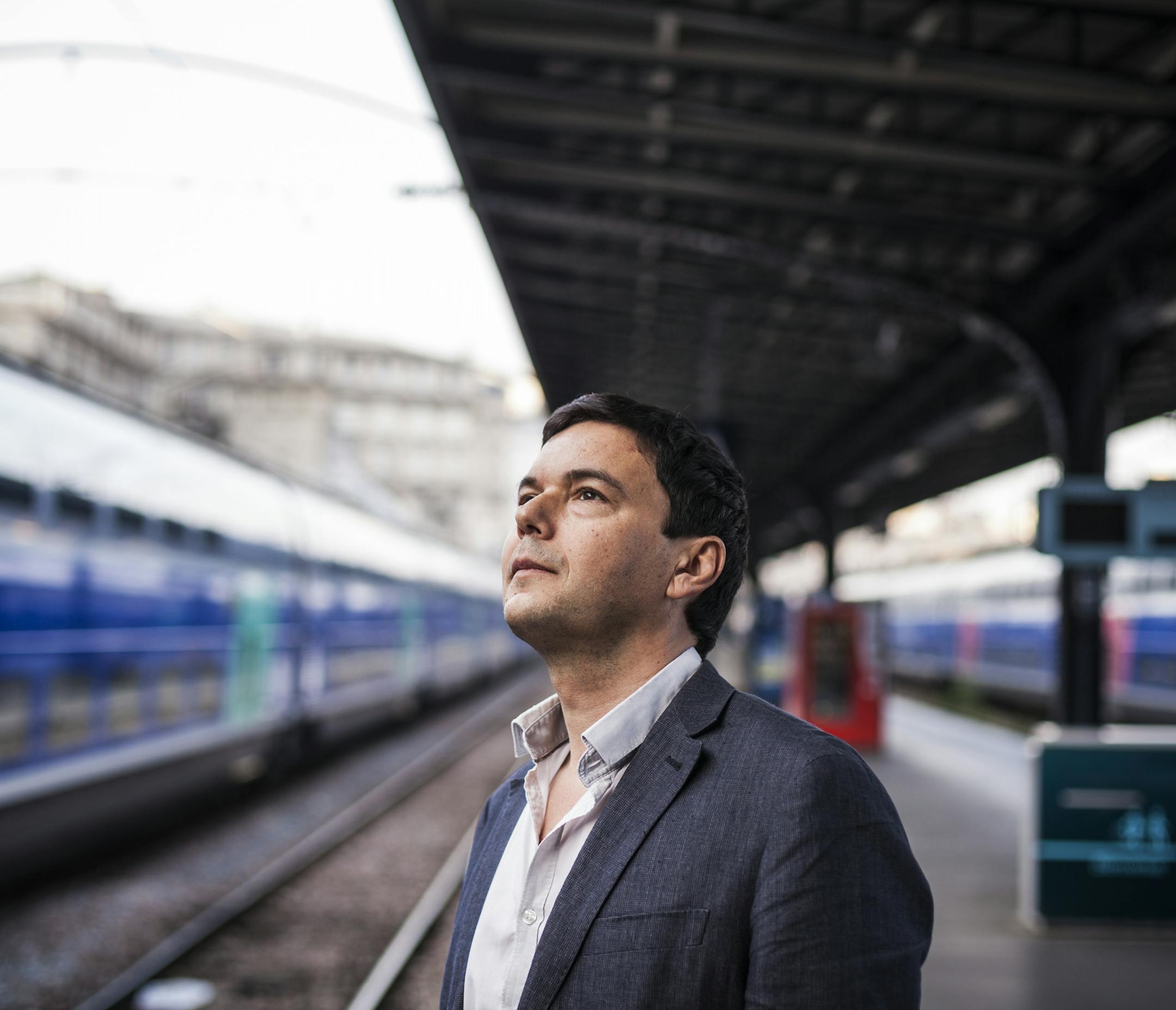 Thomas Piketty, a French economist whose work "Capital in the Twenty-First Century" has fueled fierce debates about inequality, waits for a train near his home in Paris, April 11, 2014. Piketty's work forecasts sharply increasing inequality in industrialized countries and expects the concentration of wealth to have a damaging effect on the democratic values of justice and fairness. (Ed Alcock/The New York Times) -- PHOTO MOVED IN ADVANCE AND NOT FOR USE - ONLINE OR IN PRINT - BEFORE APRIL 20, 20
